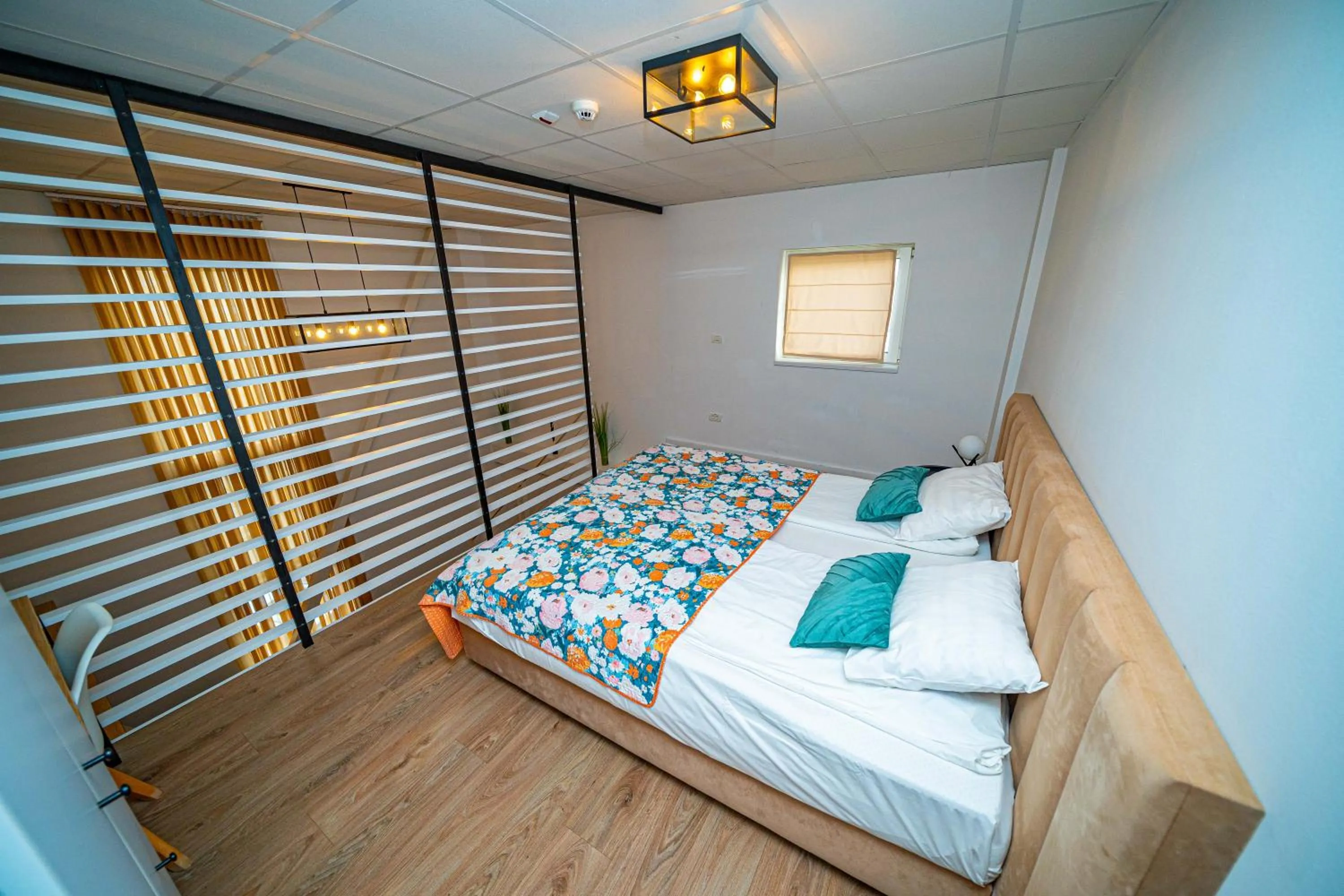 Bed in FRIENDS RESIDENCE Apartments