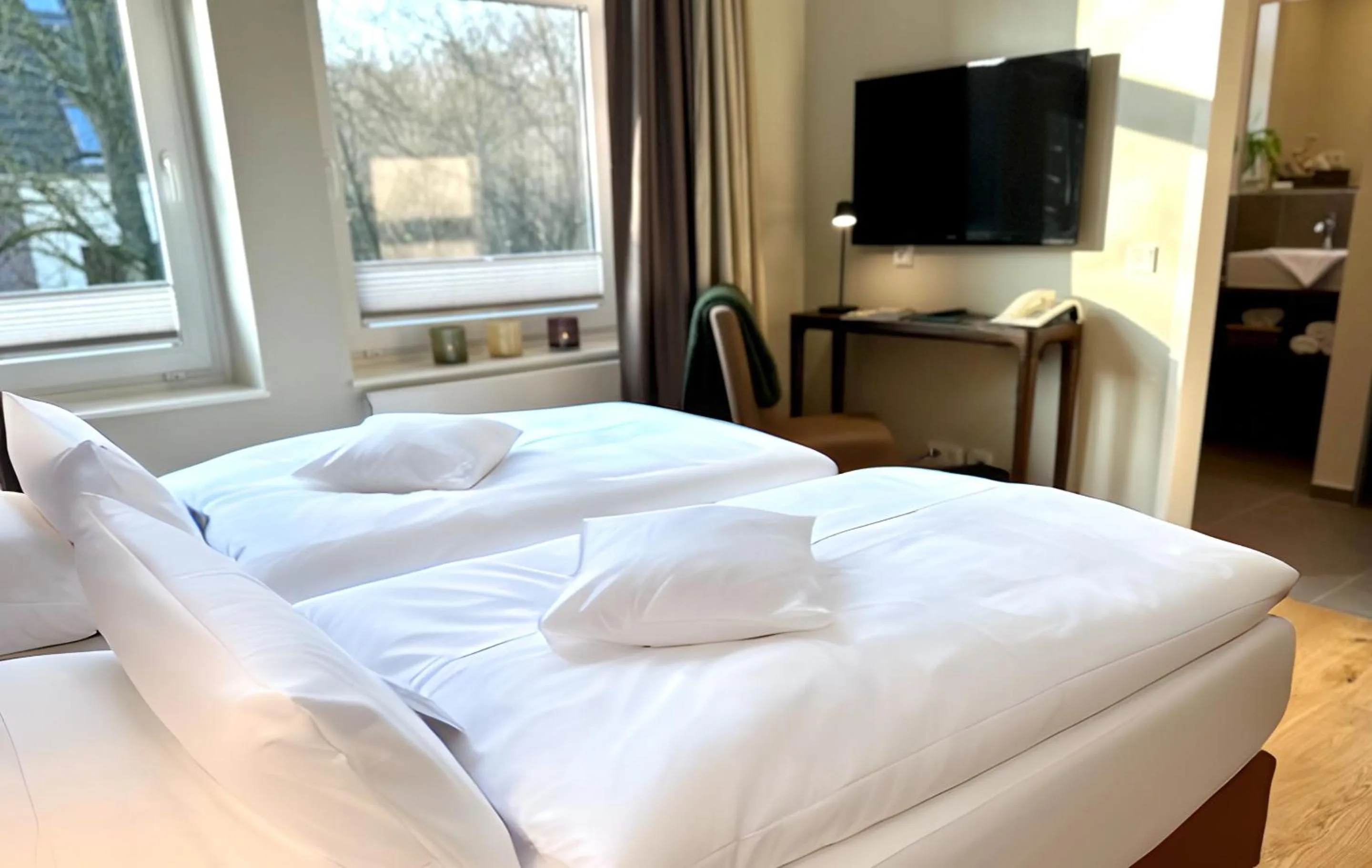 TV and multimedia, Bed in MUNTE - Wellnesshotel am Stadtwald