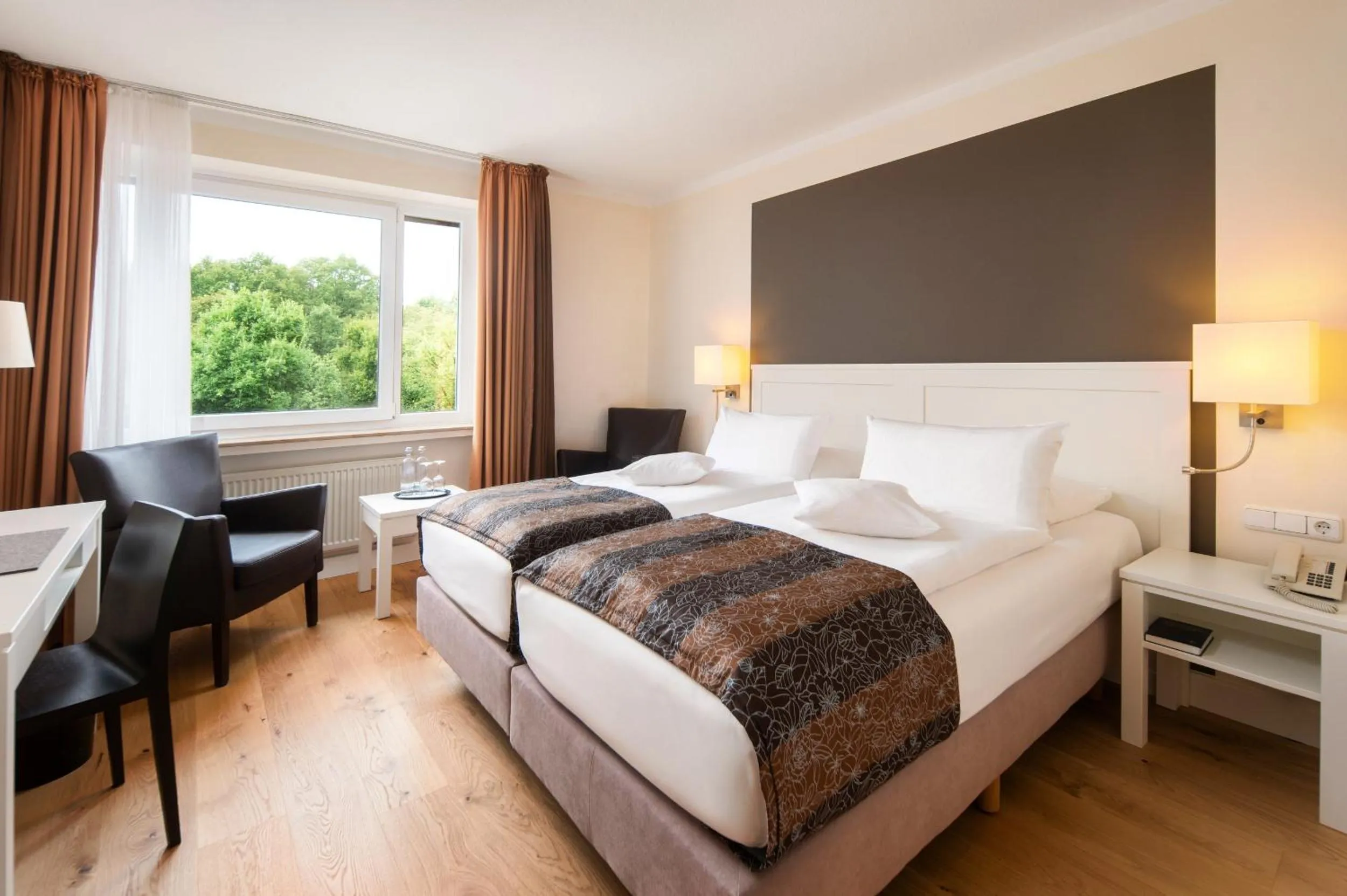 Bed in MUNTE - Wellnesshotel am Stadtwald
