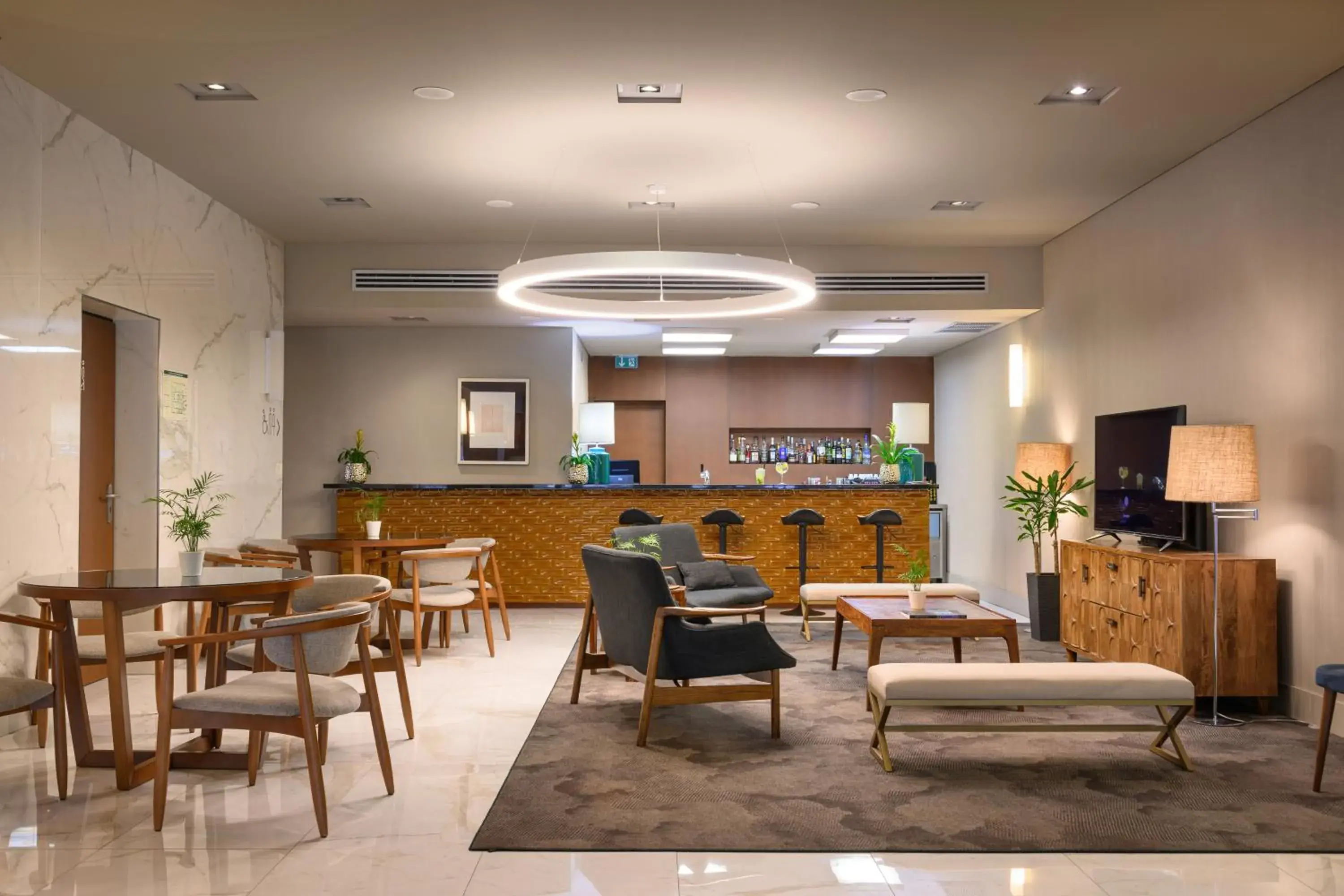 Lounge or bar in Melia Setubal Lounge or bar in Melia Setubal