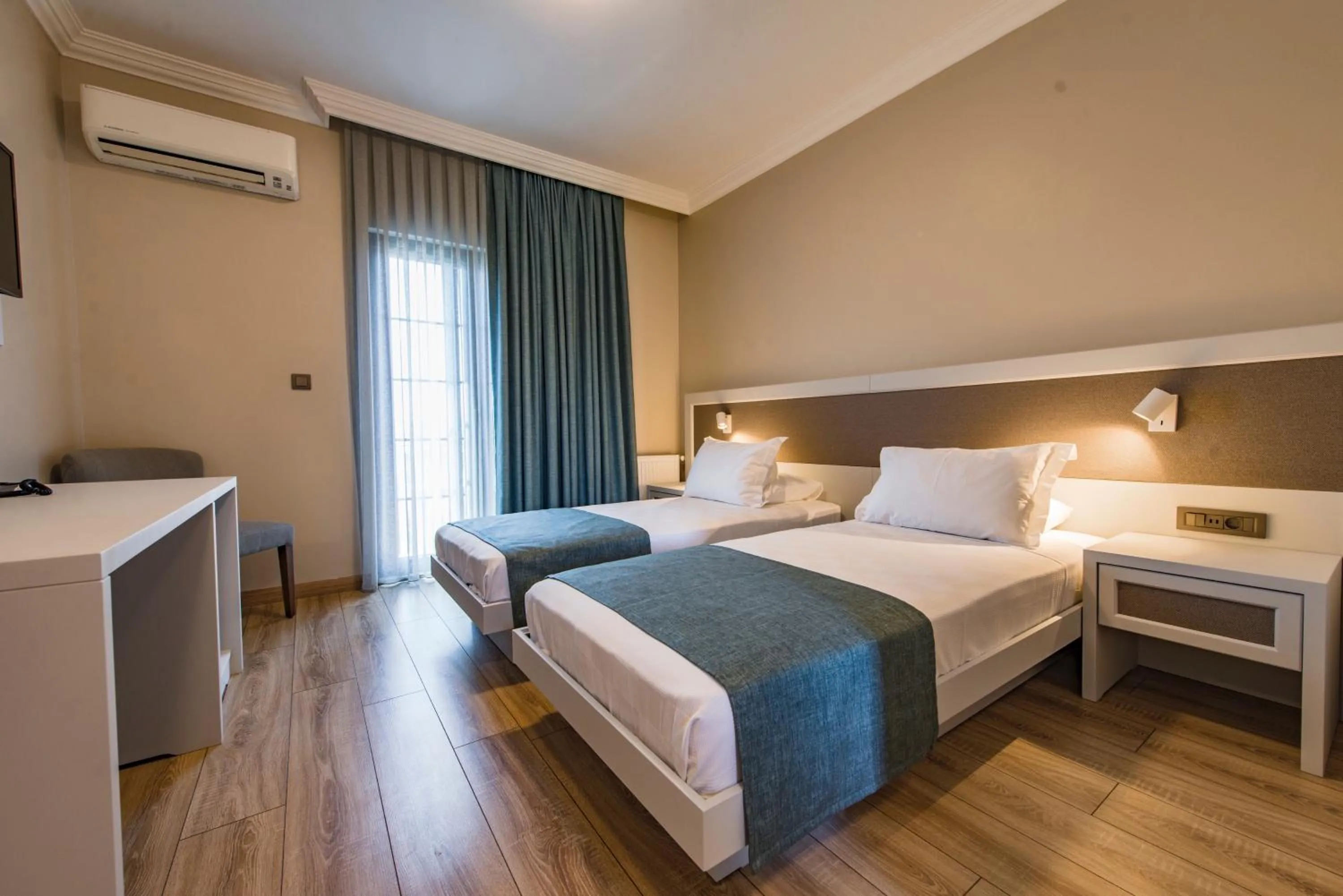 Bed in Elia Hotel Cunda by Ortunc