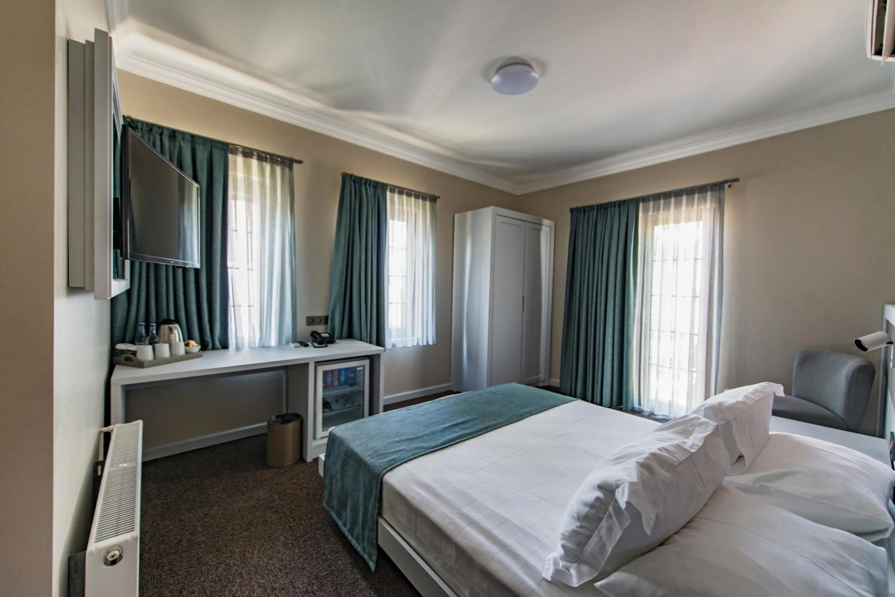 Bed in Elia Hotel Cunda by Ortunc