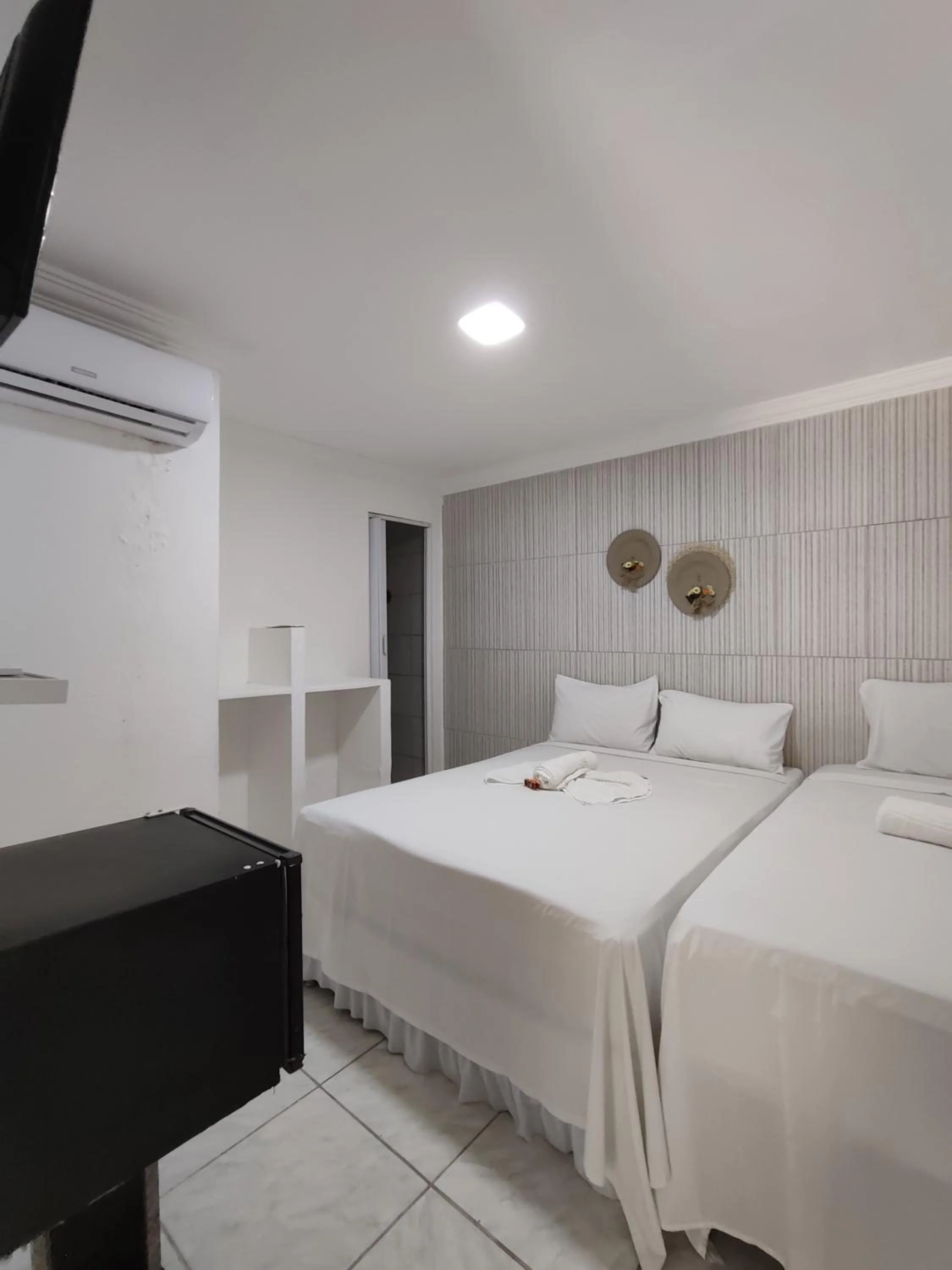 Bed in Ecomar Pousada