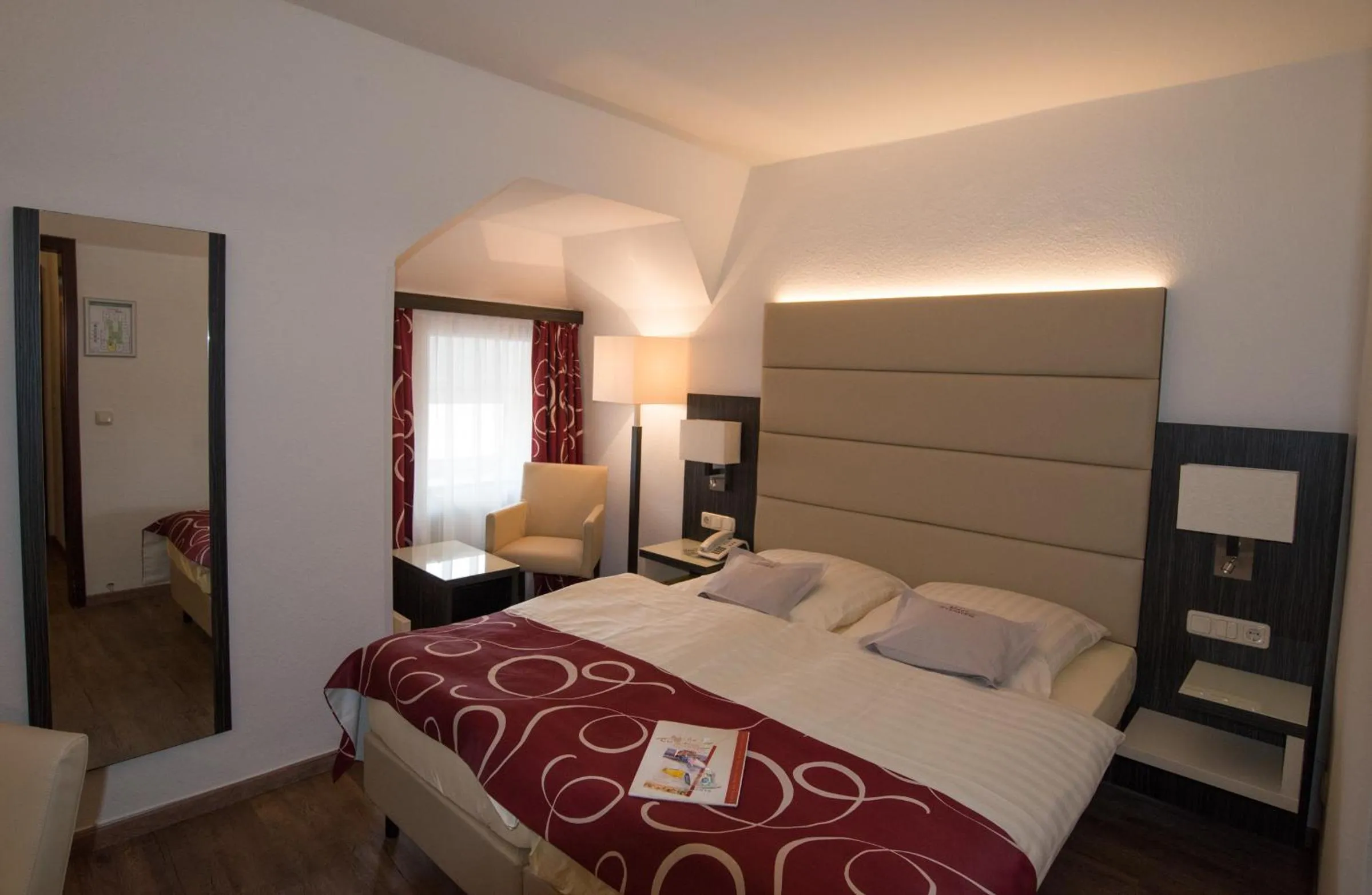 Photo of the whole room, Bed in Hotel Stadt Cuxhaven