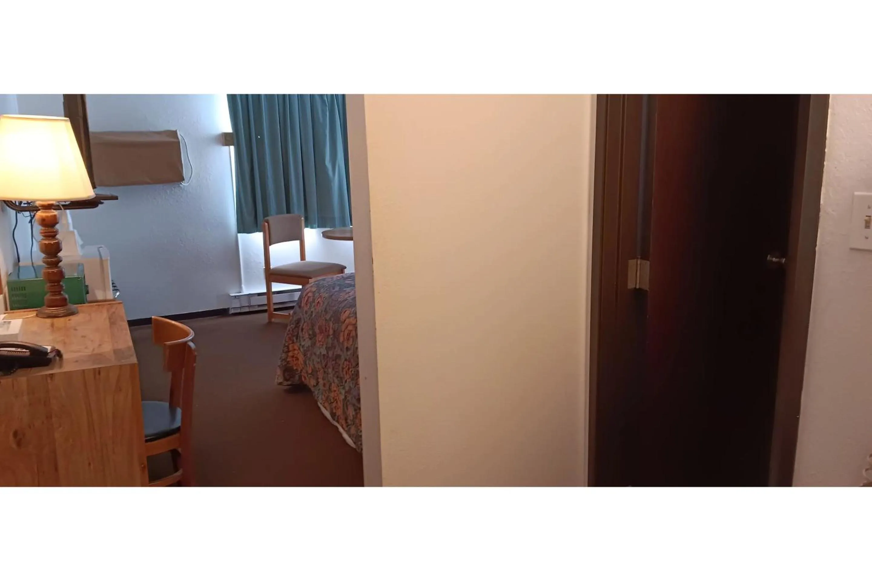 Bedroom in Scotwood Motel by OYO Washburn ND