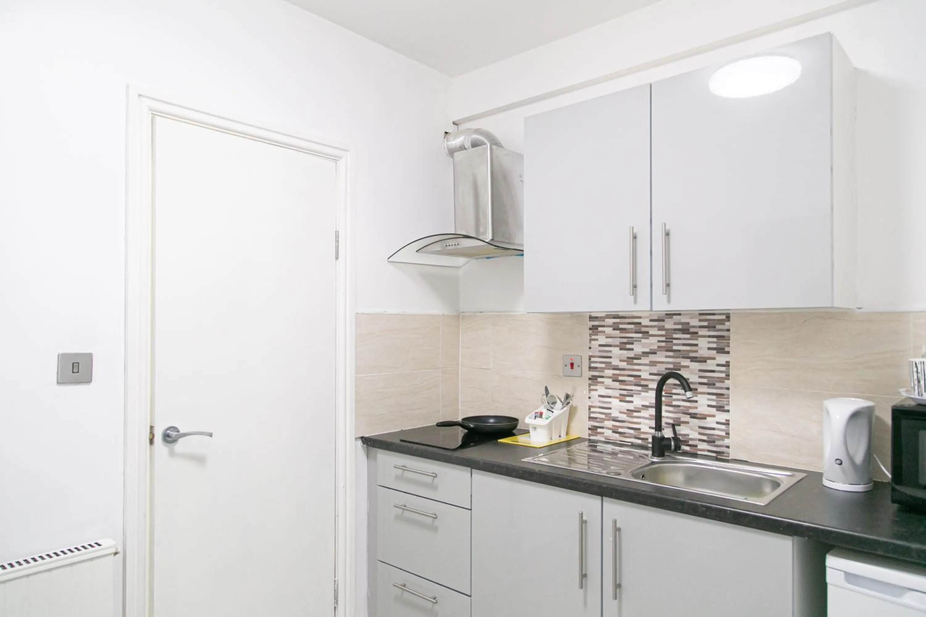 Kitchen or kitchenette in Cheetham Hills Apartments