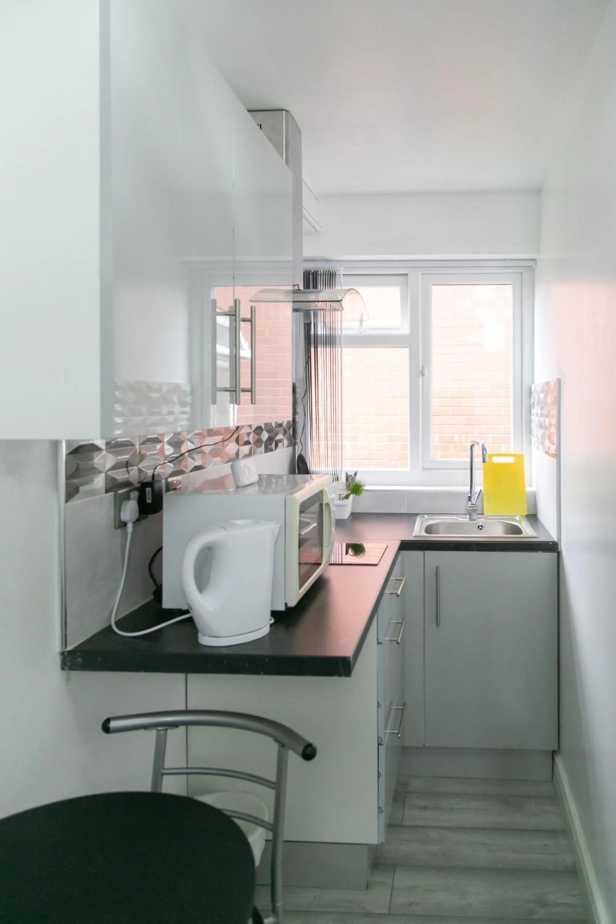 Kitchen or kitchenette in Cheetham Hills Apartments