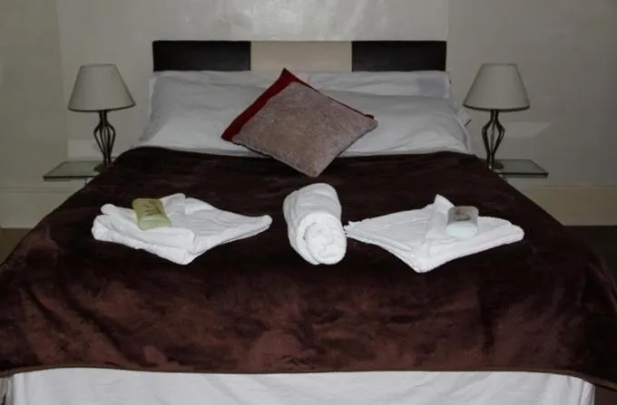 Bed in The Crystal Lodge Hotel