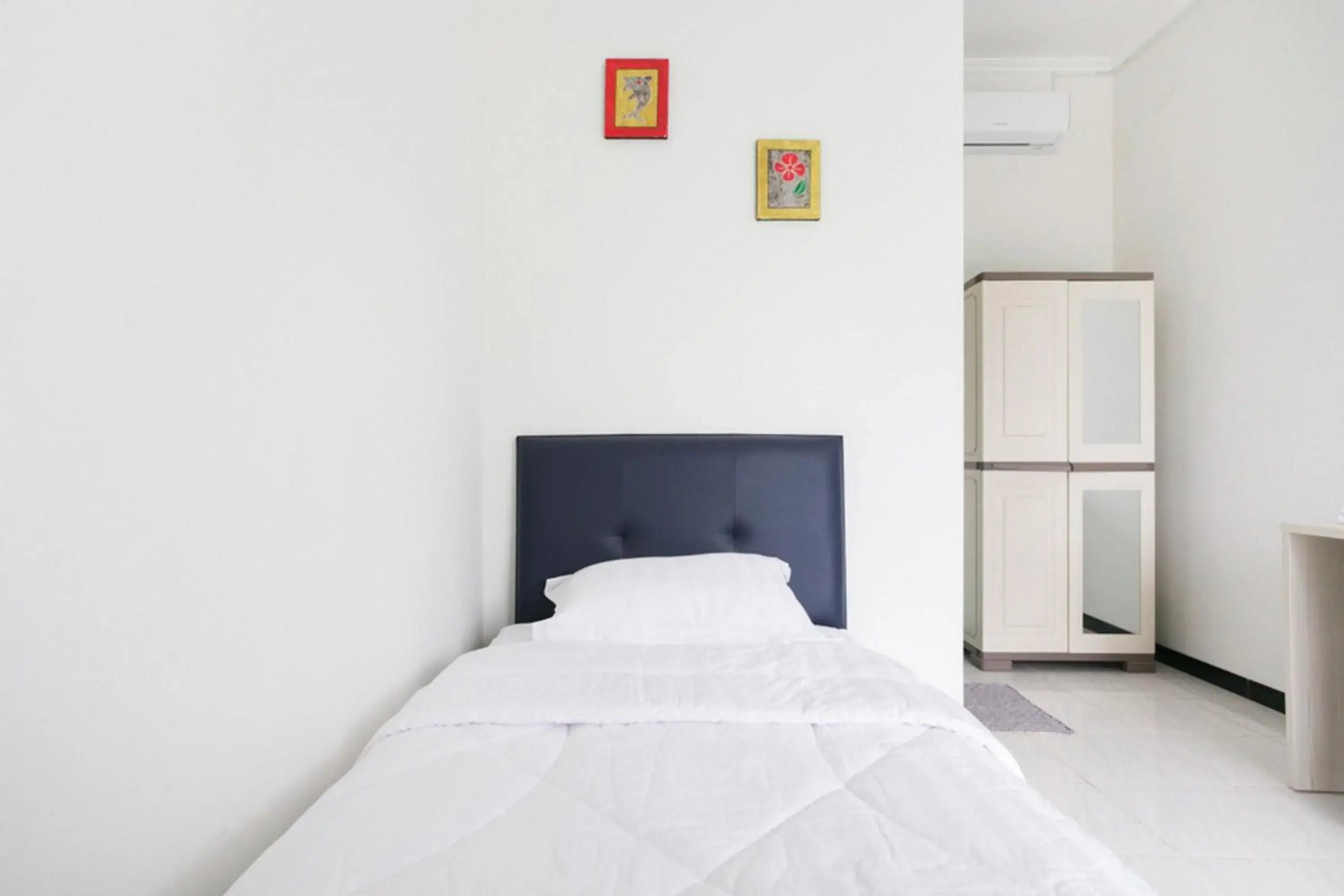 Bed in RedDoorz Syariah near Stadion Teladan Medan Bed in RedDoorz Syariah near Stadion Teladan Medan