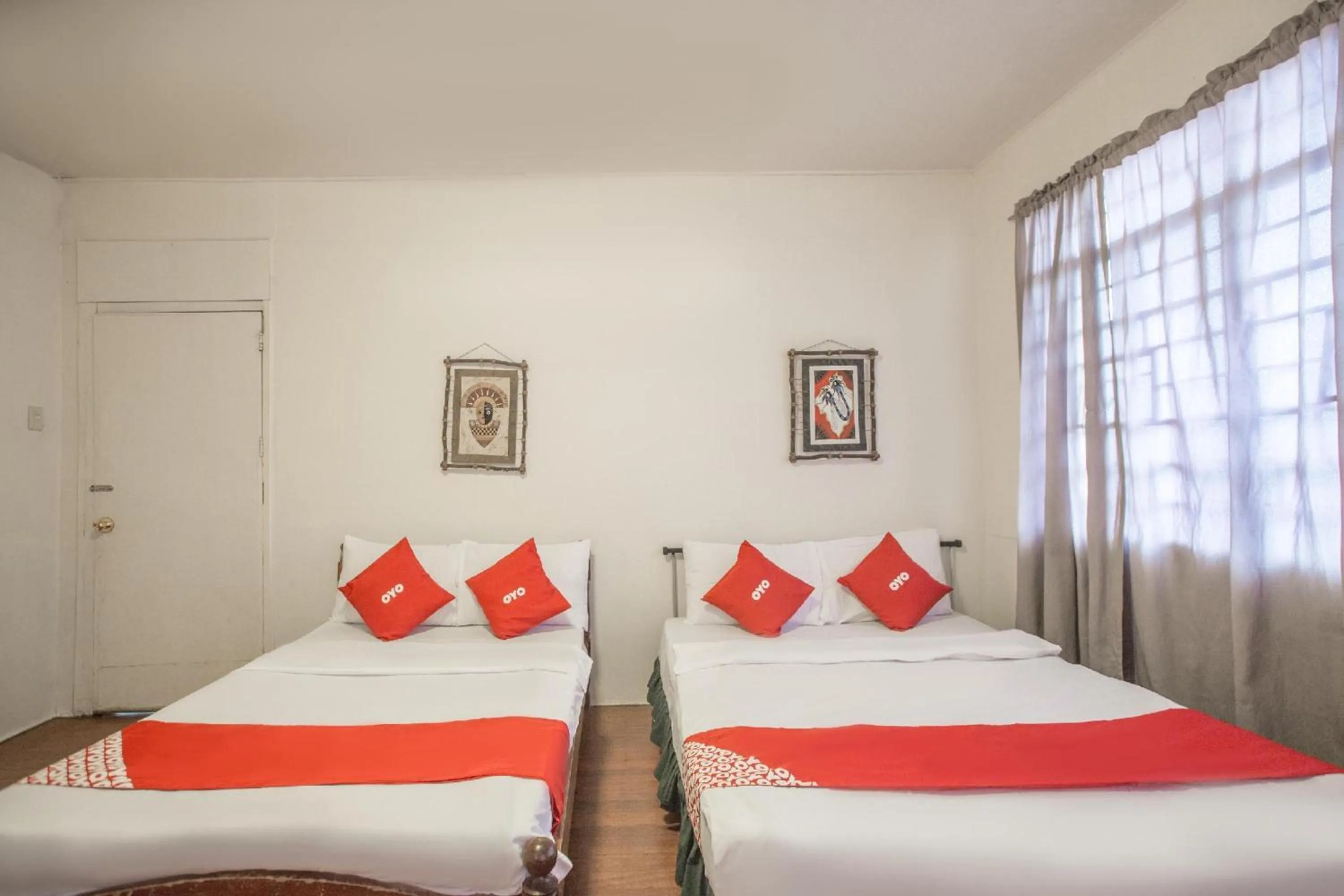 Bedroom, Bed in OYO 588 Sunrock Resort