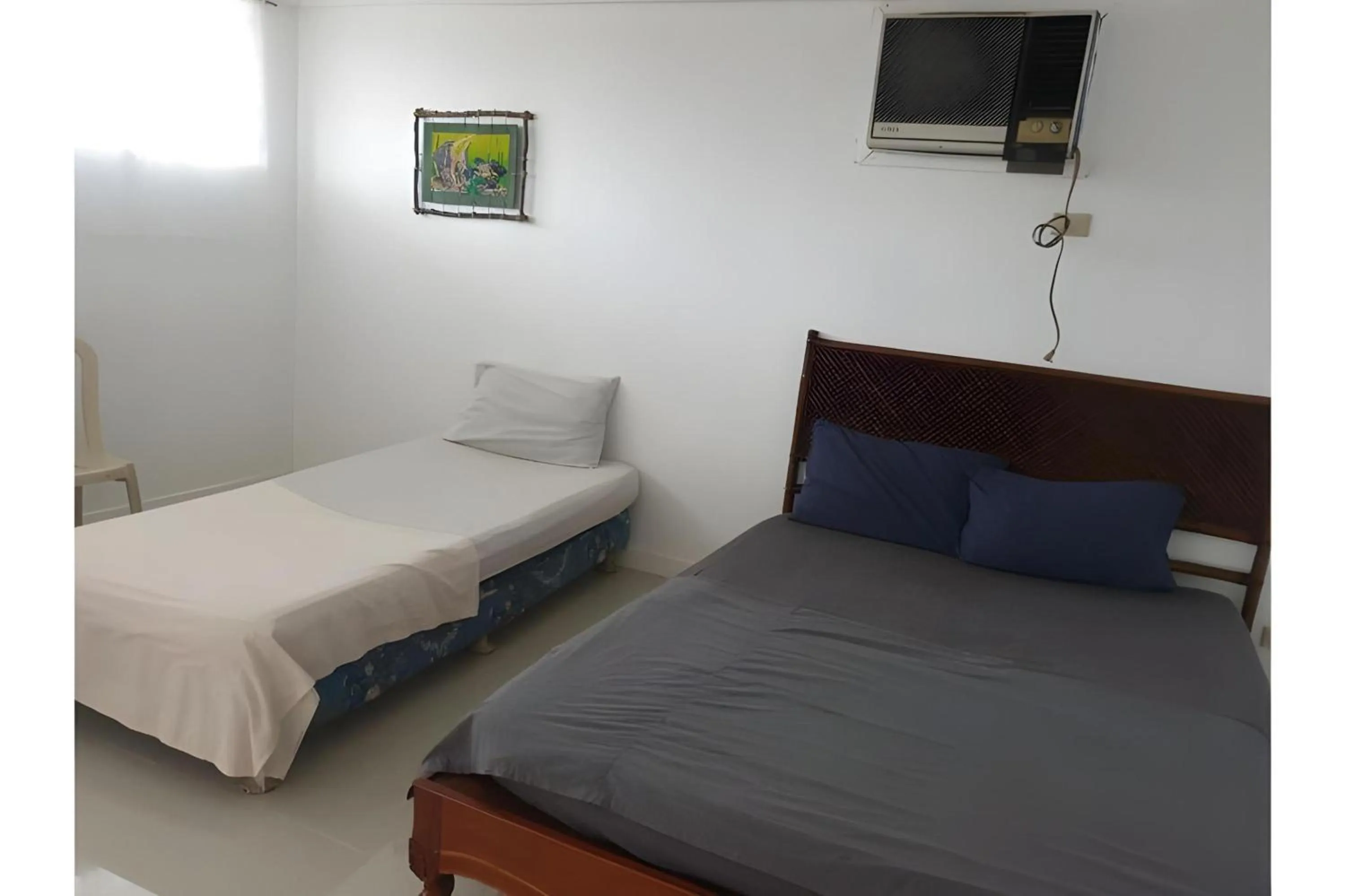 Photo of the whole room, Bed in OYO 588 Sunrock Resort