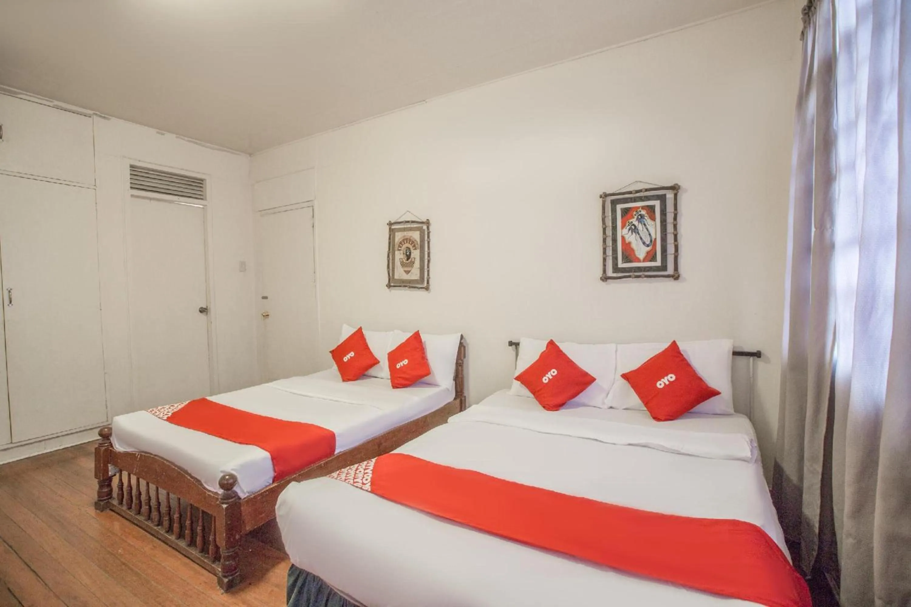 Bedroom, Bed in OYO 588 Sunrock Resort