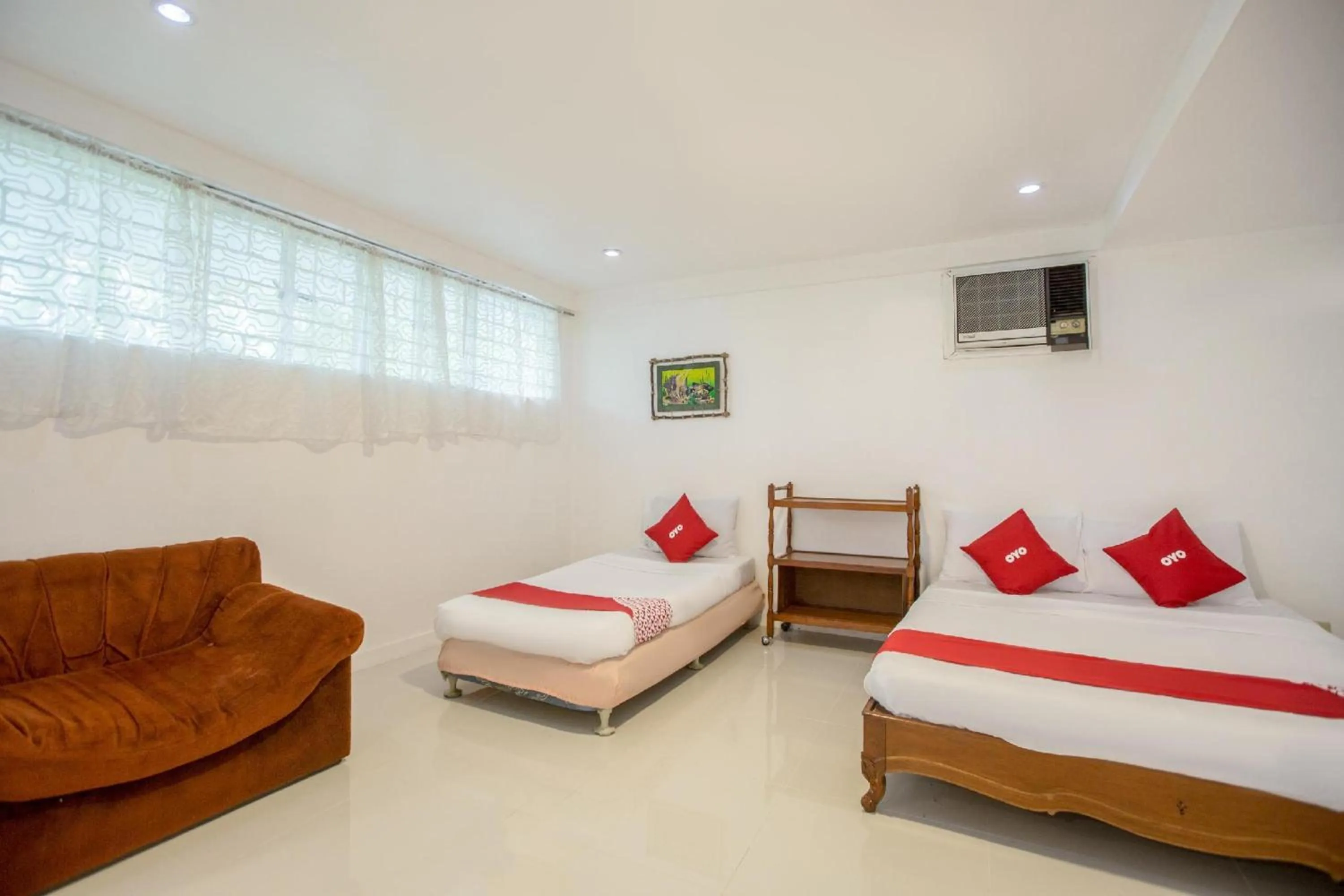 Bedroom, Bed in OYO 588 Sunrock Resort