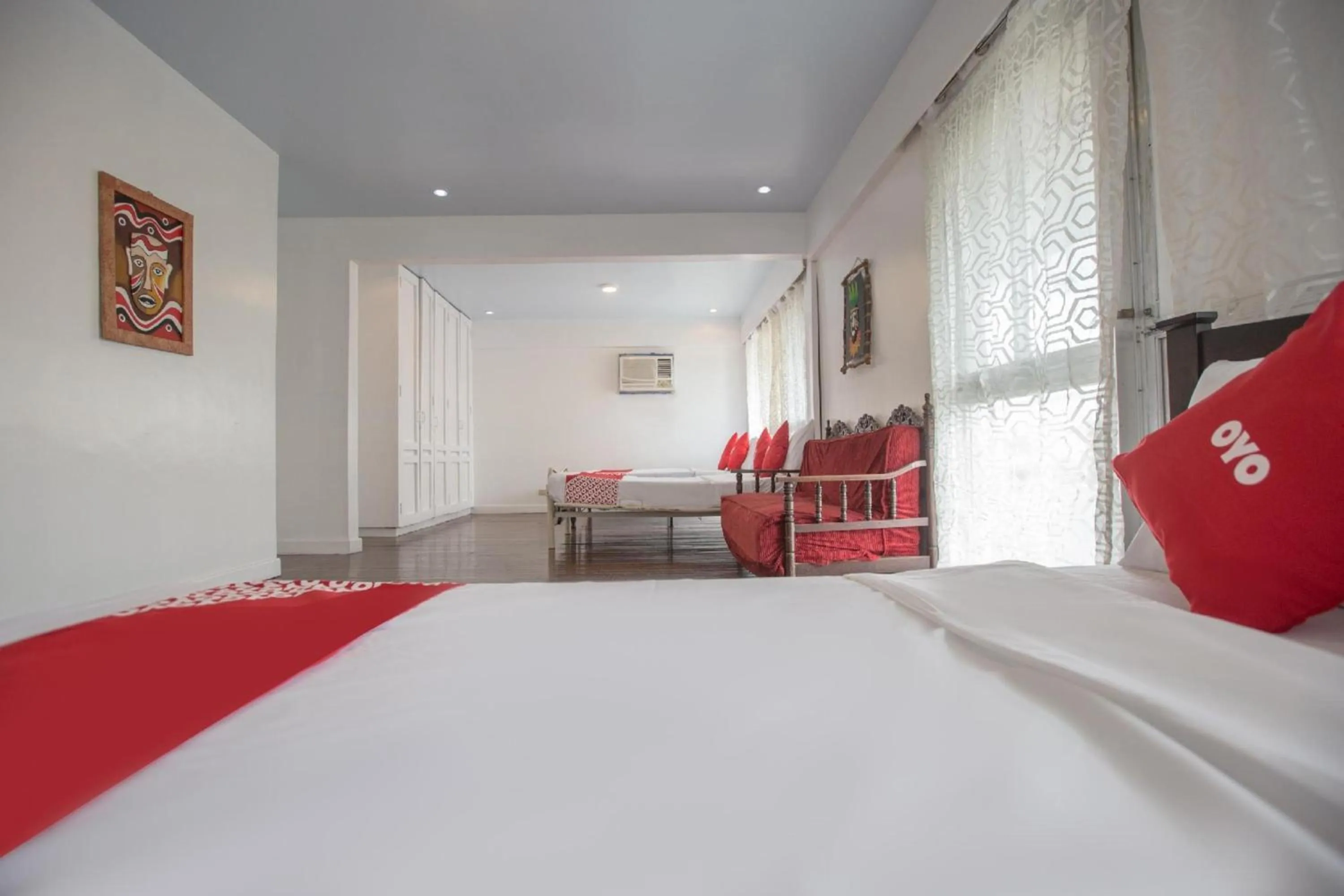 Bedroom, Bed in OYO 588 Sunrock Resort