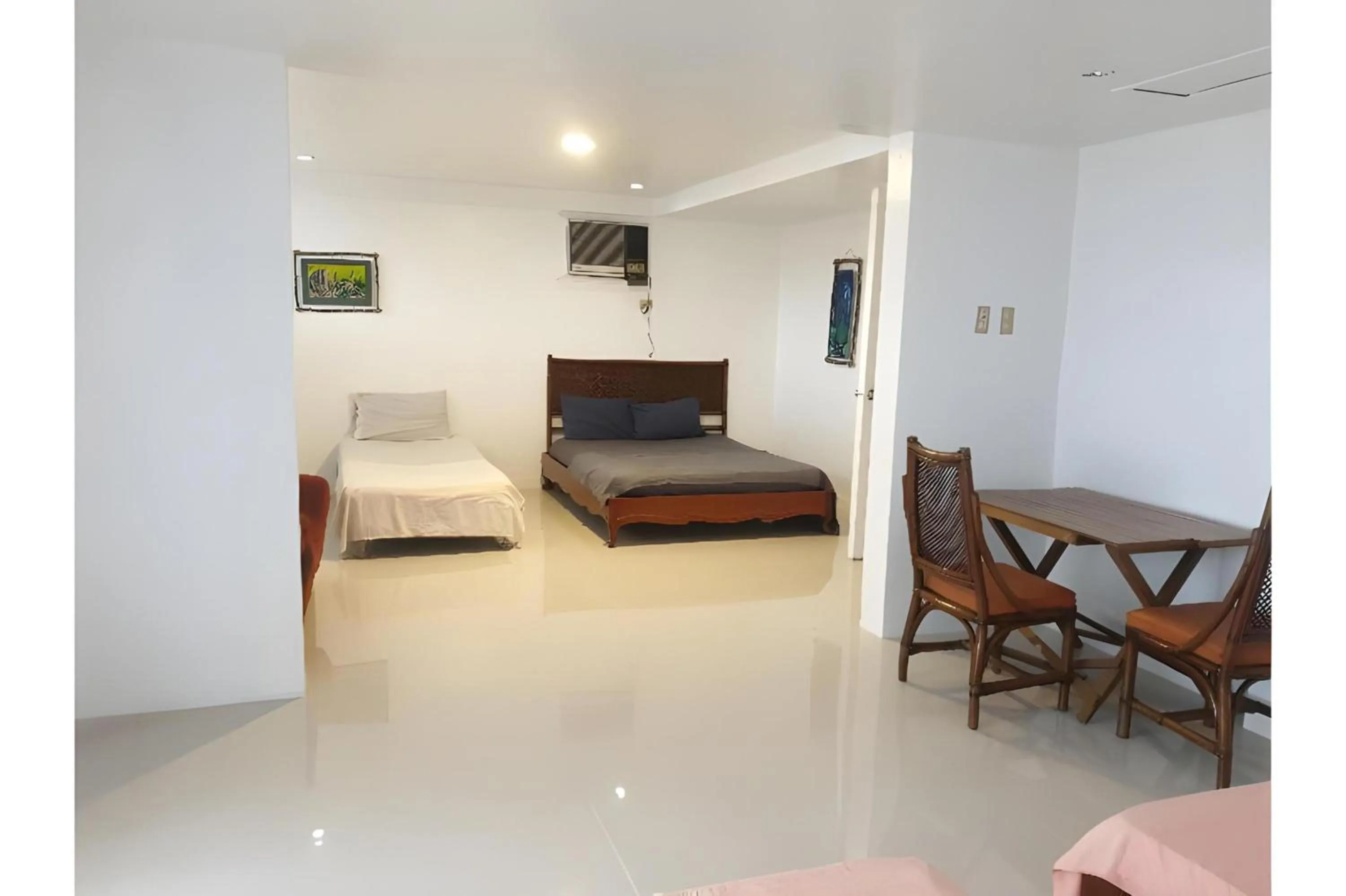 Photo of the whole room, Bed in OYO 588 Sunrock Resort