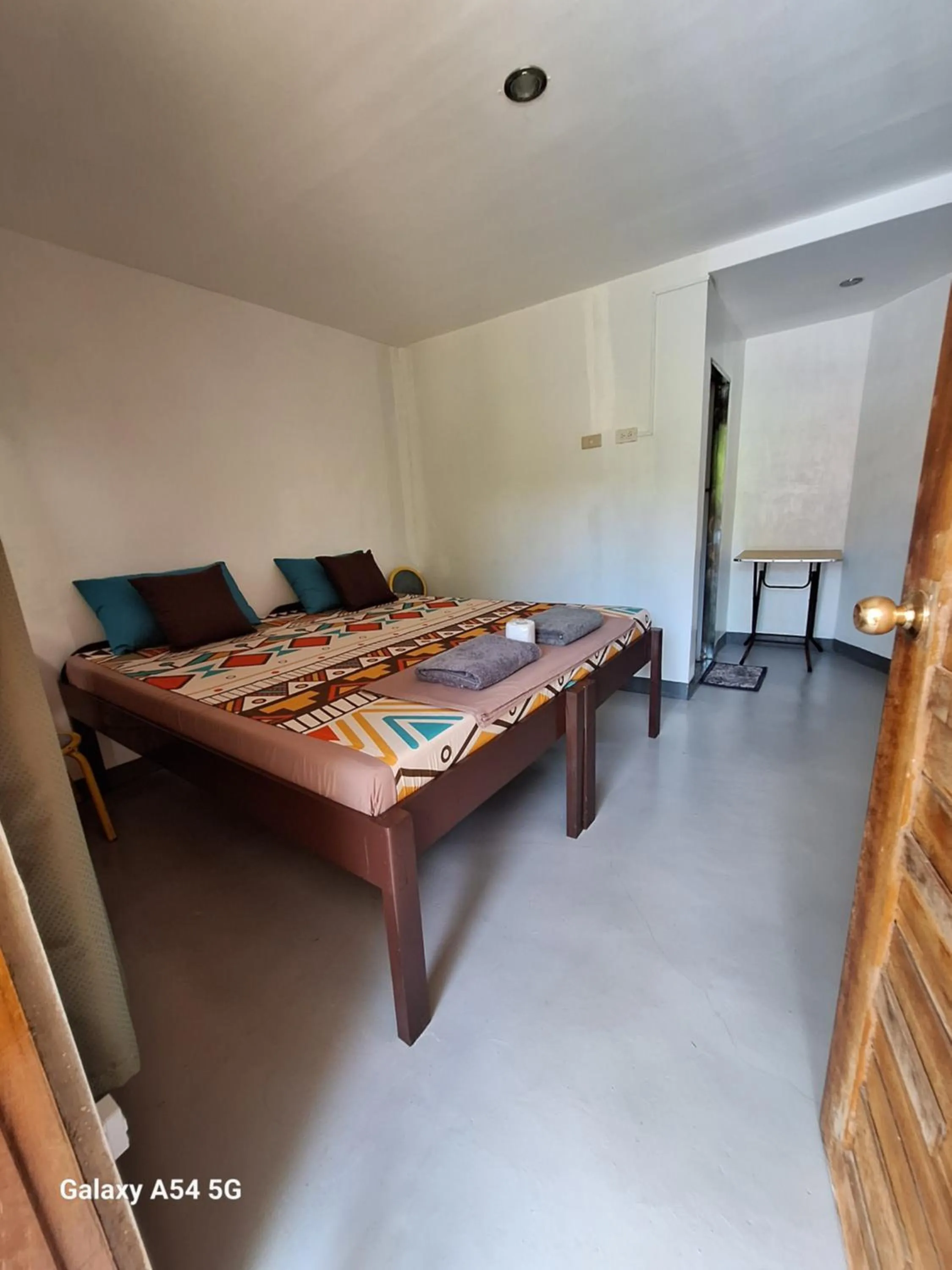 Bed in Rain Haven Lodging House