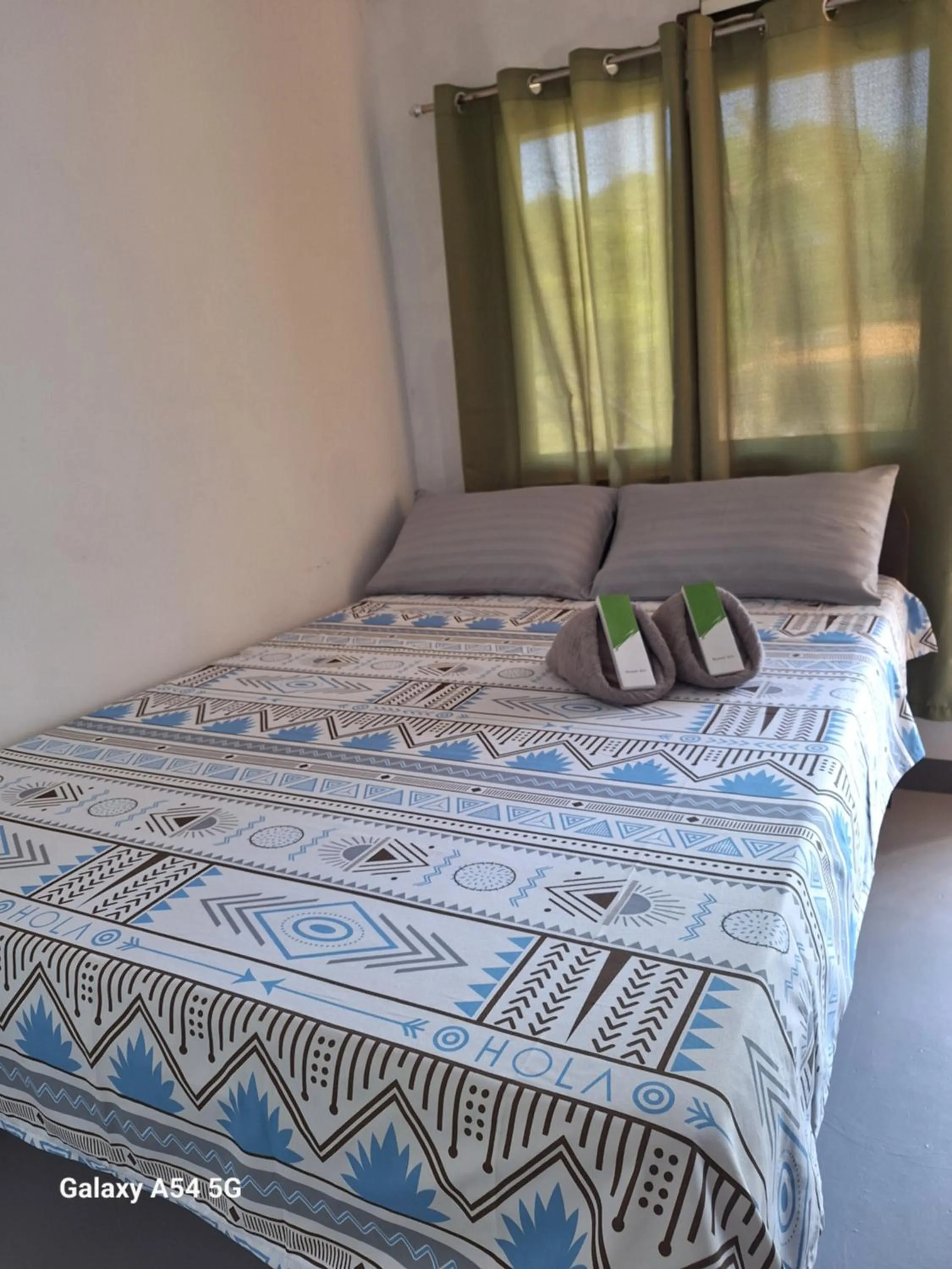 Bed in Rain Haven Lodging House