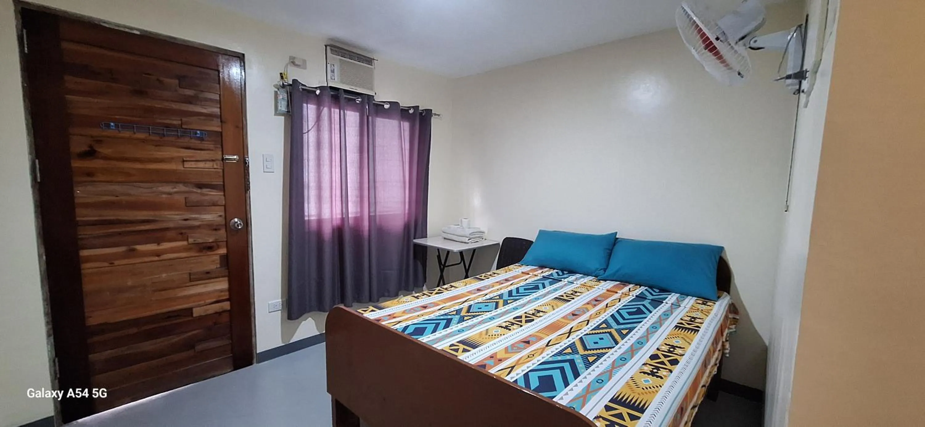 Bed in Rain Haven Lodging House