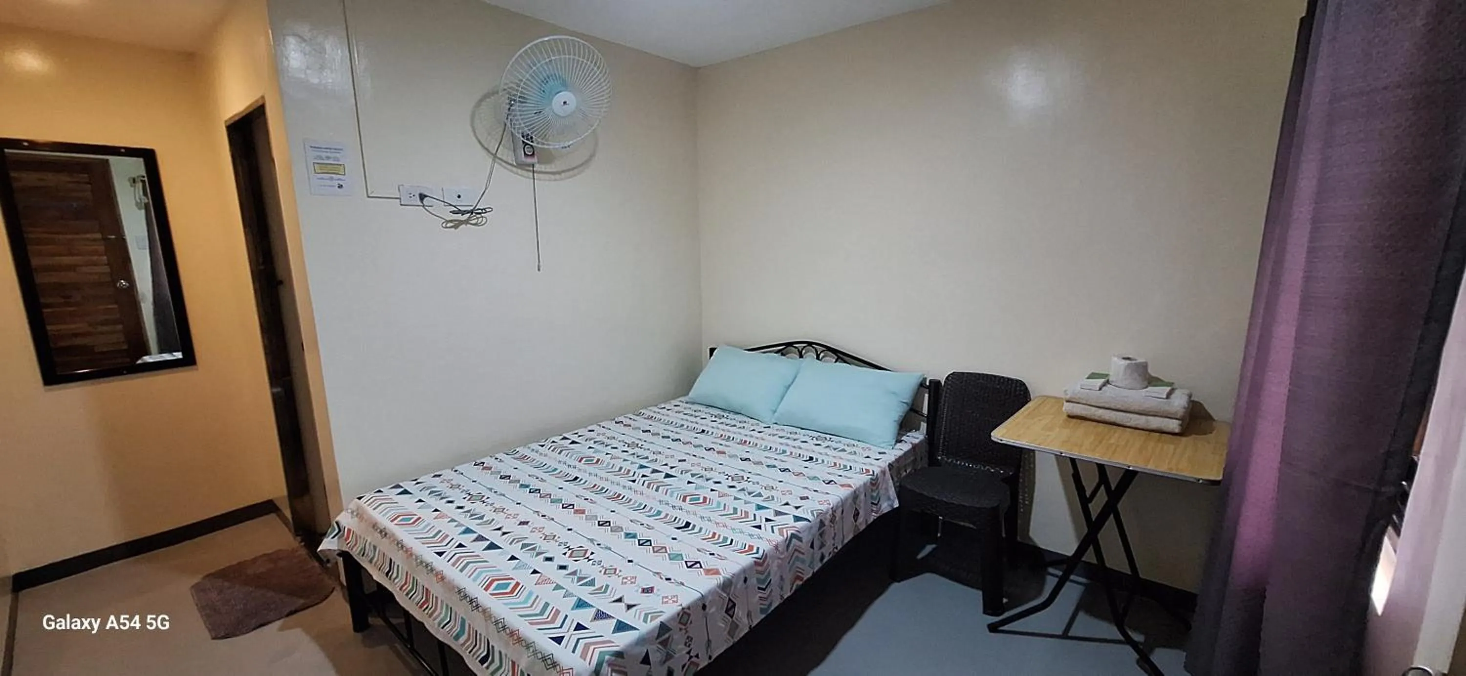 Bed in Rain Haven Lodging House