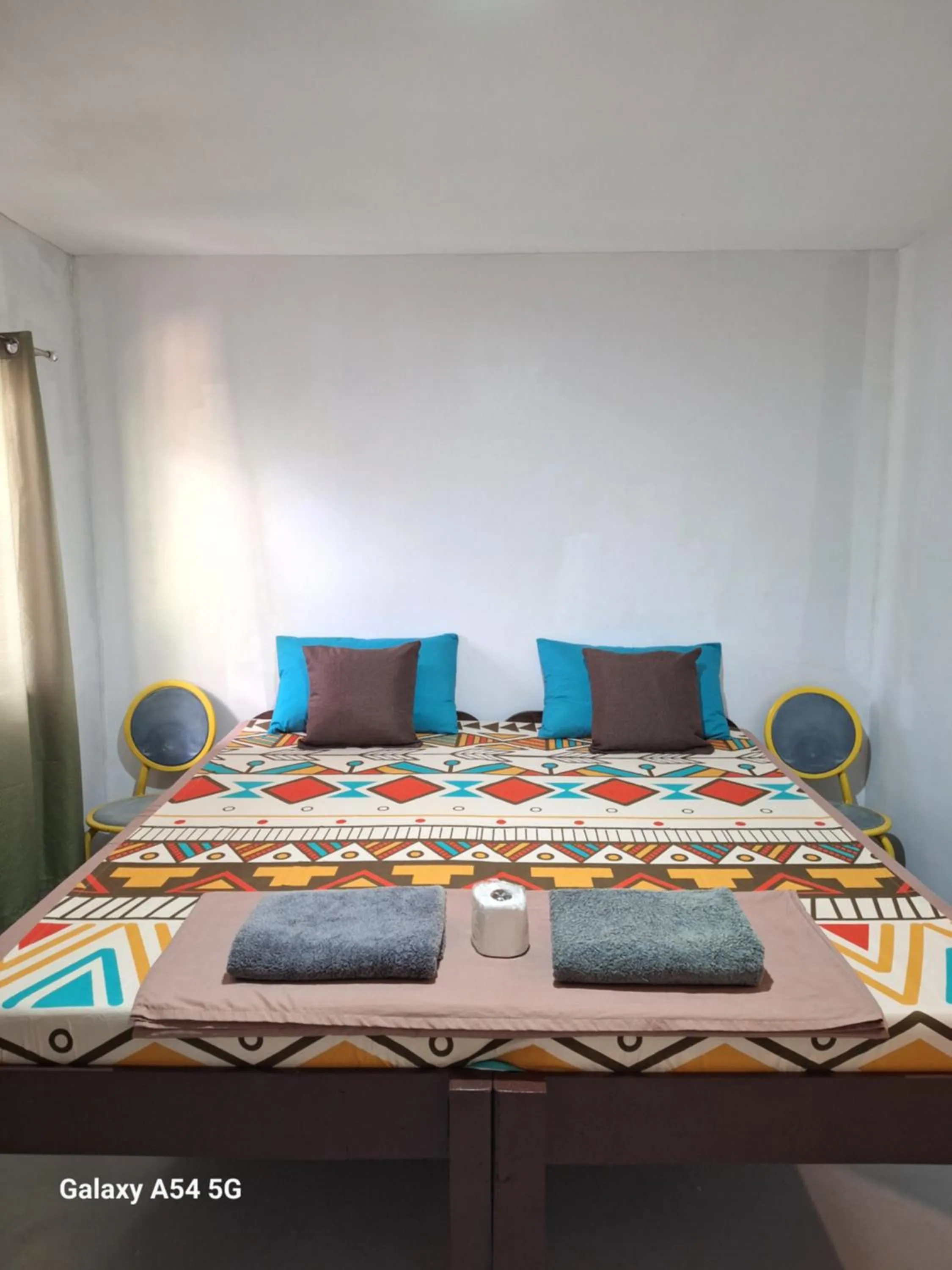 Bed in Rain Haven Lodging House