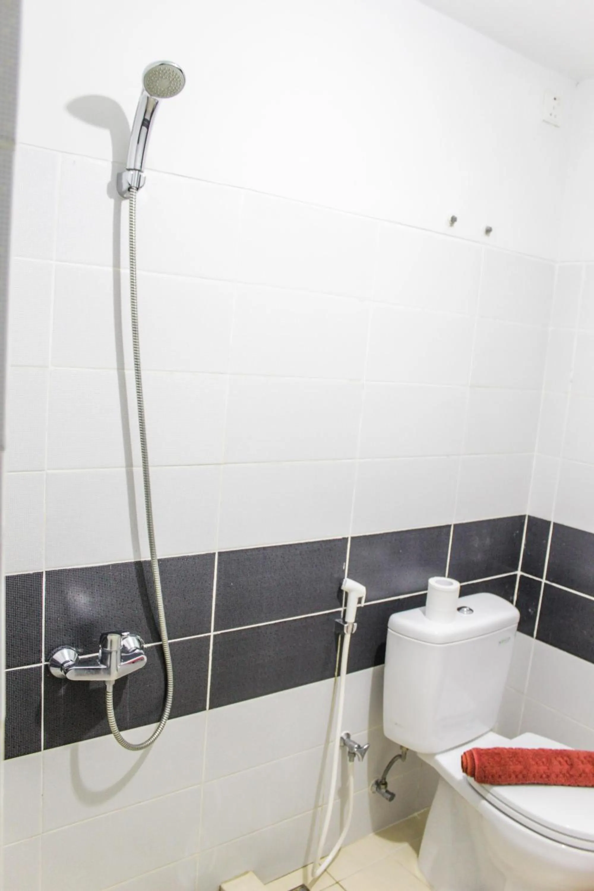 Bathroom in Minimalist and Comfy 1BR Apartment Scientia Residence By Travelio