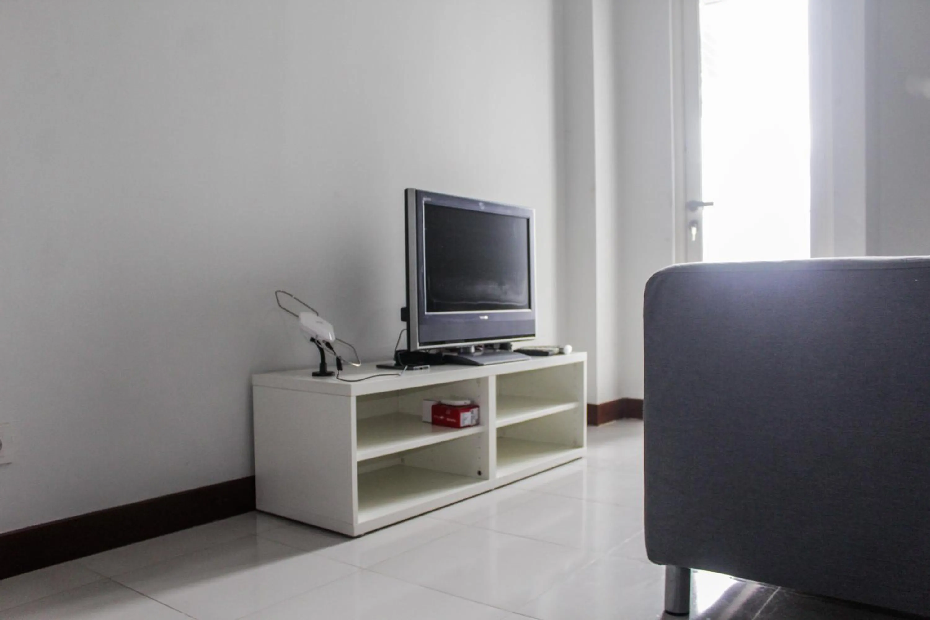 Minimalist and Comfy 1BR Apartment Scientia Residence By Travelio