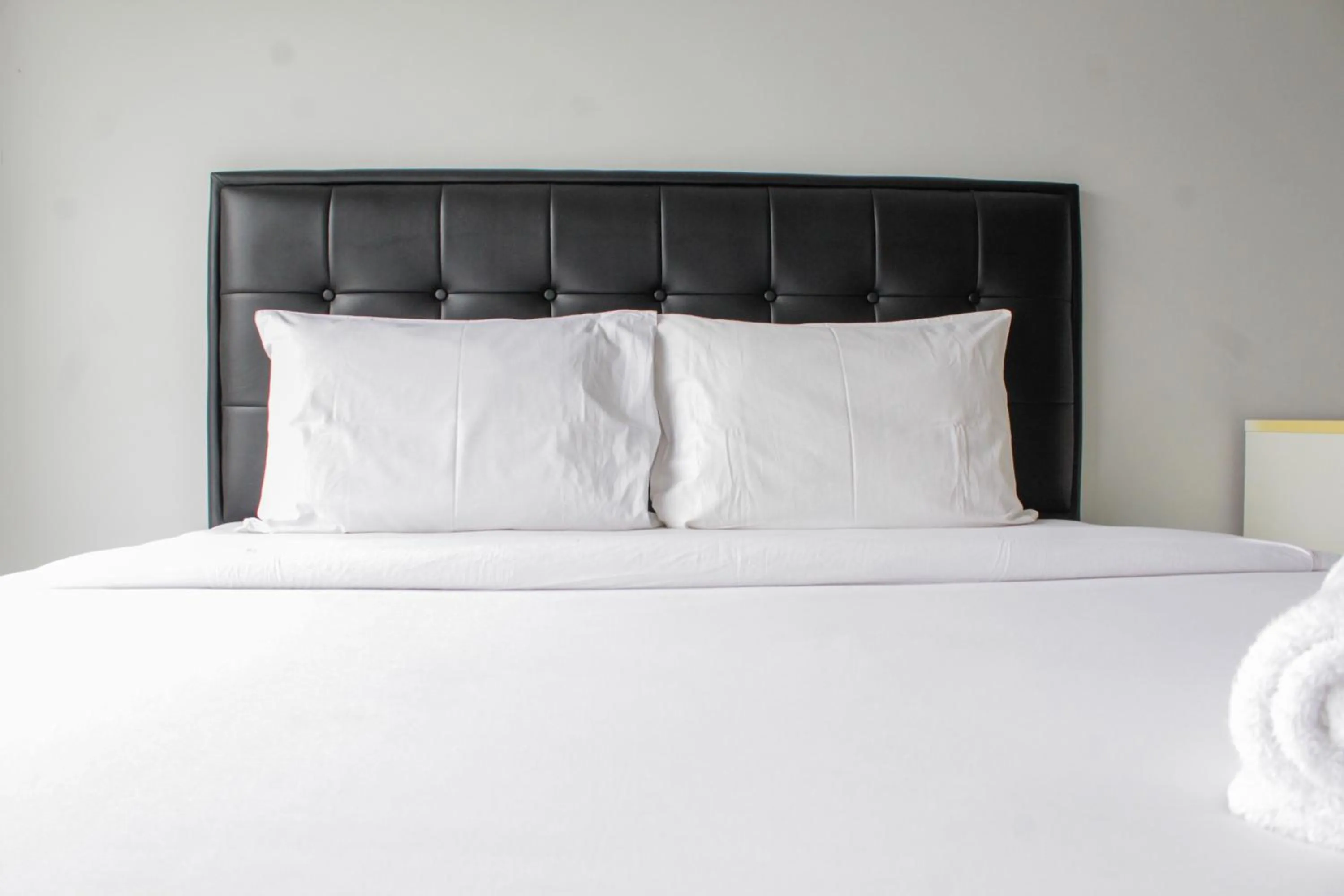 Minimalist and Comfy 1BR Apartment Scientia Residence By Travelio