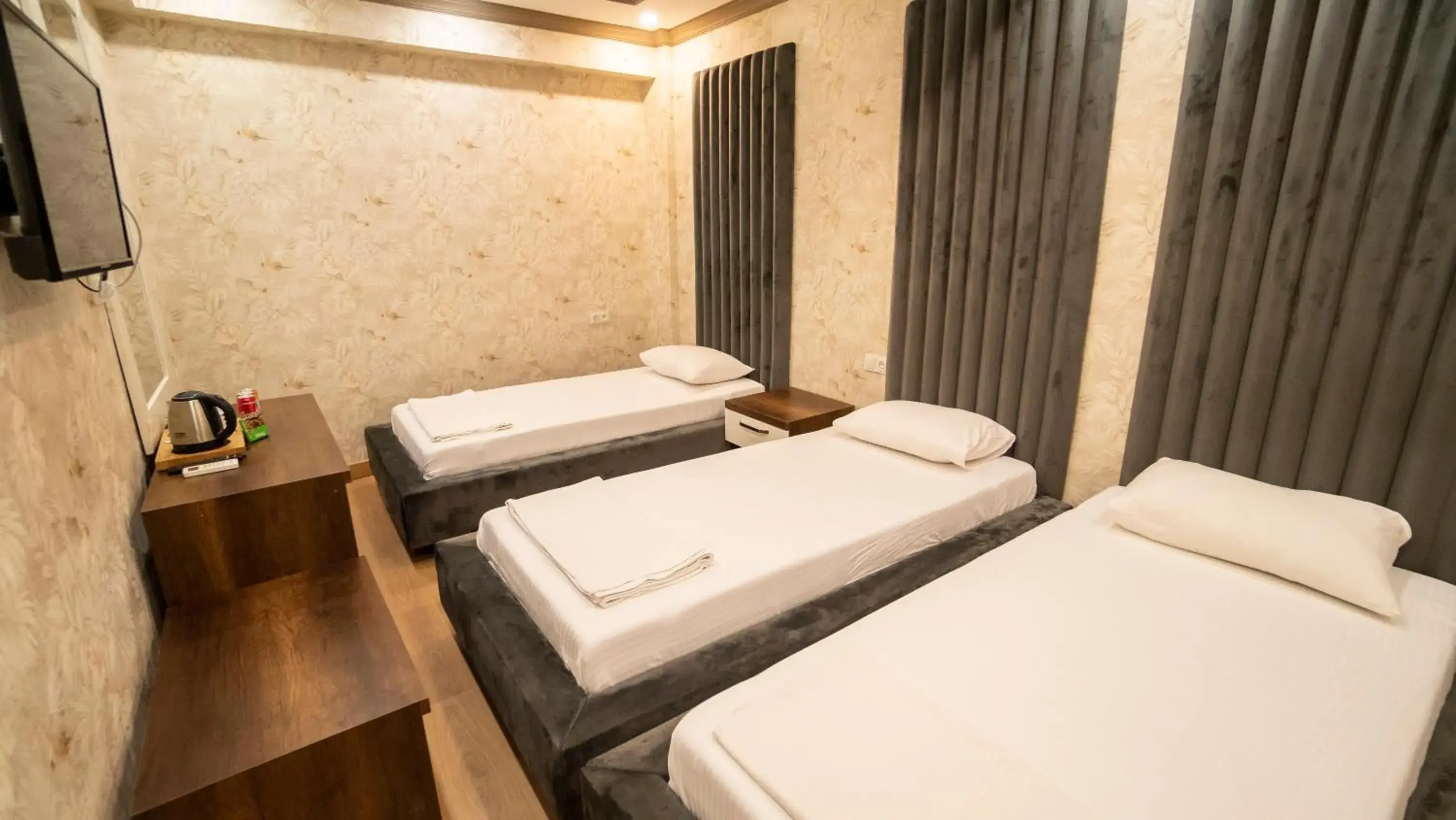 Bed in DYMAR HOTEL Bed in DYMAR HOTEL