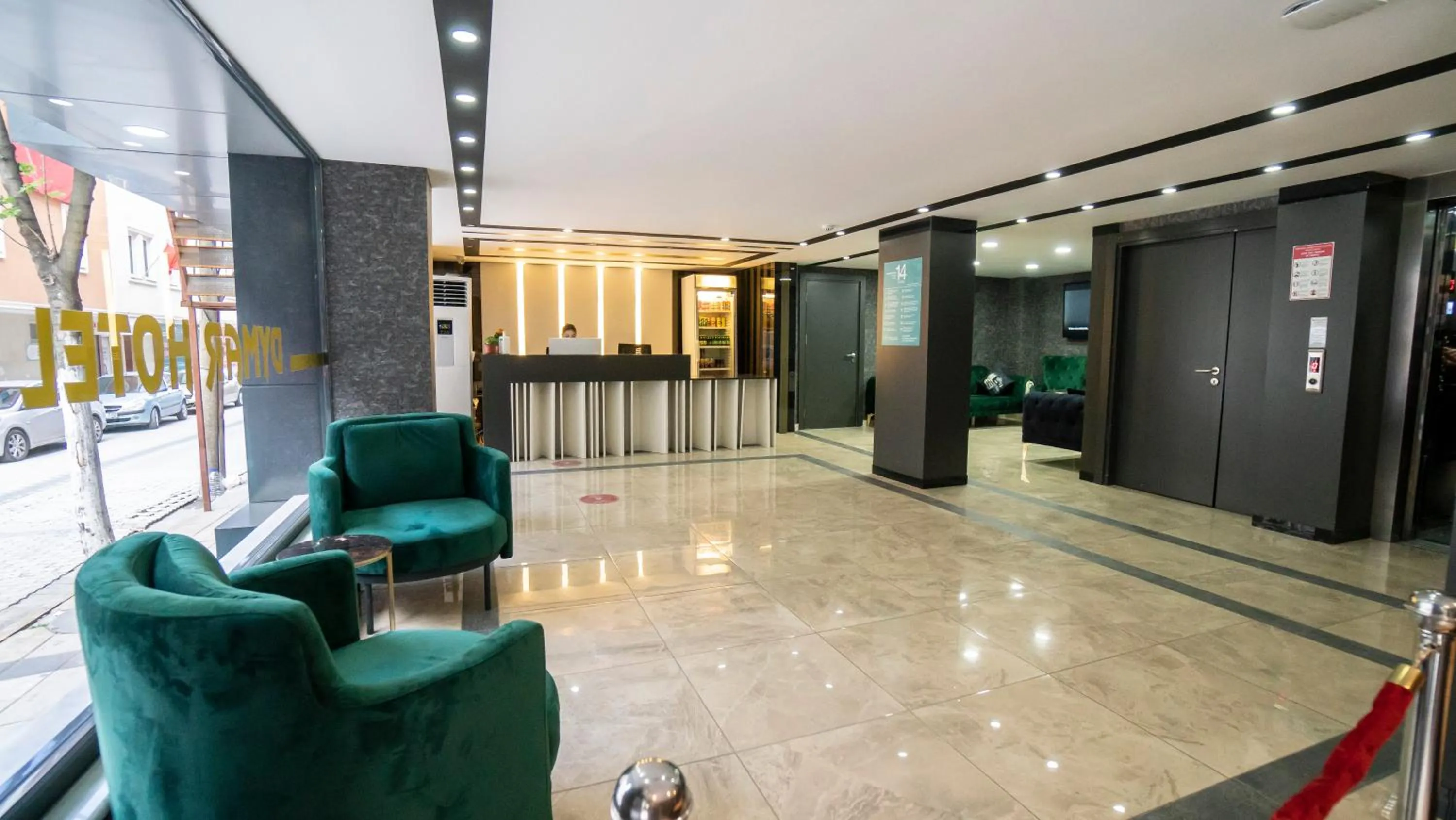 Living room in DYMAR HOTEL