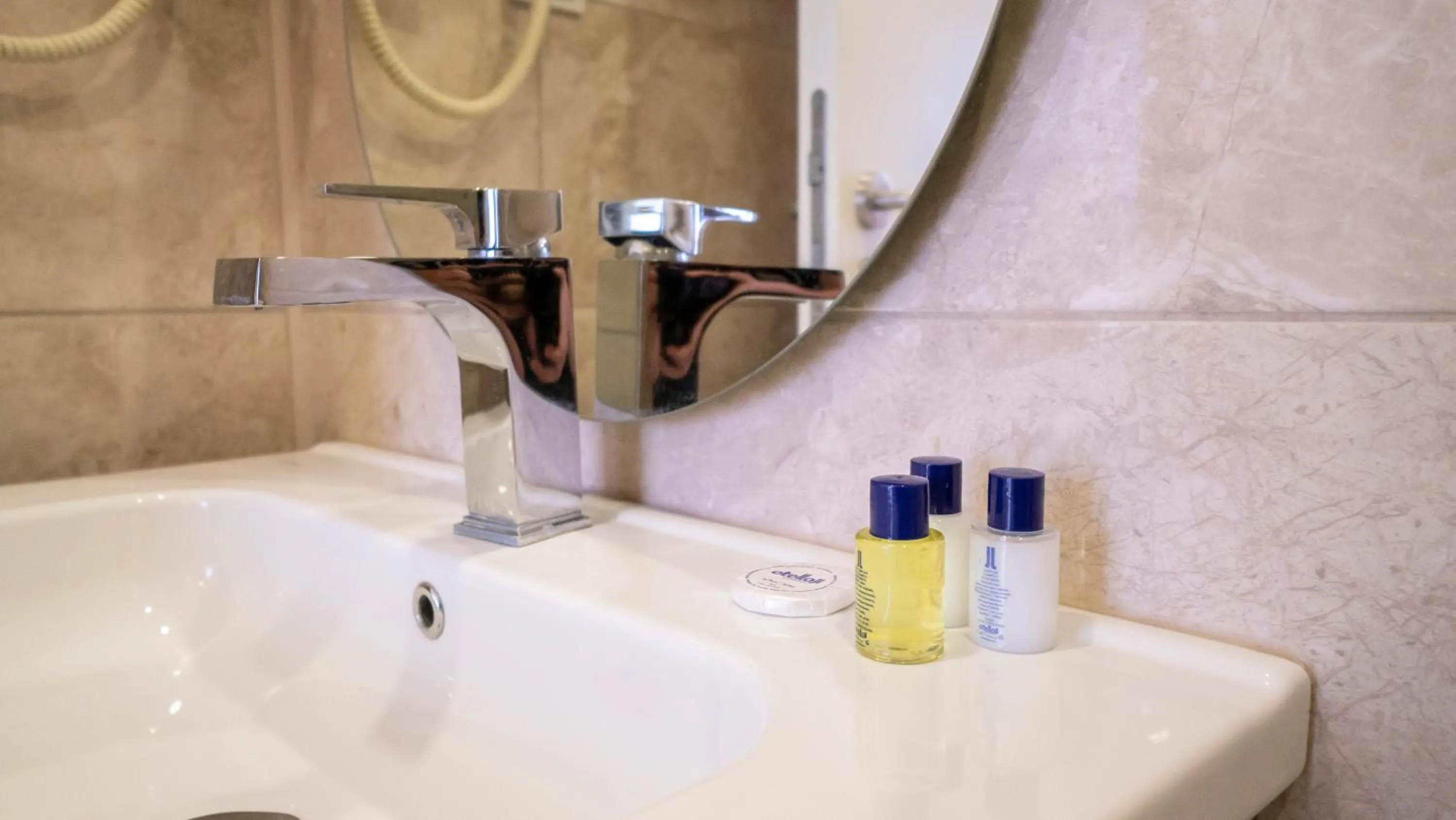 Bathroom in DYMAR HOTEL