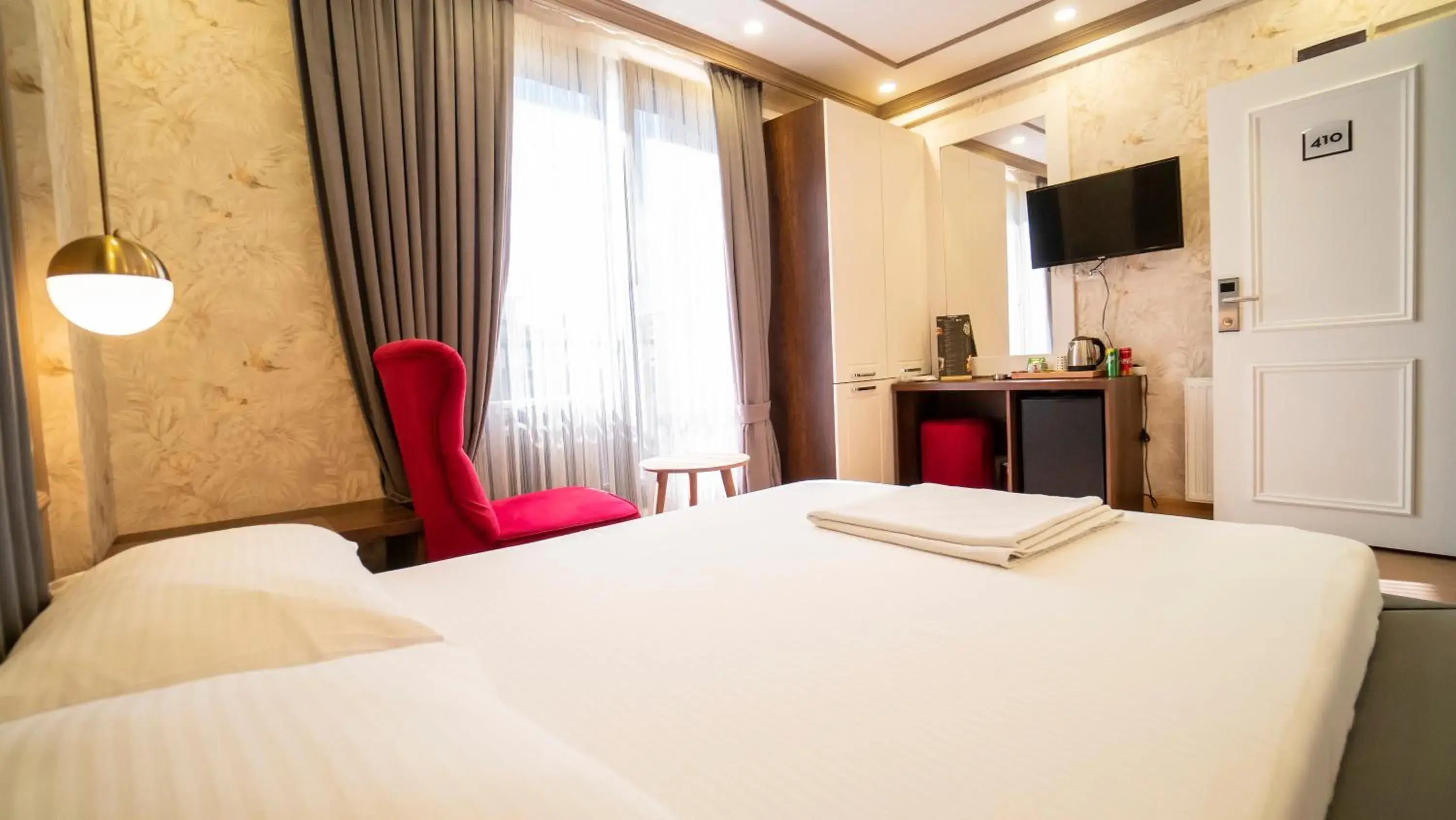 Bed in DYMAR HOTEL Bed in DYMAR HOTEL