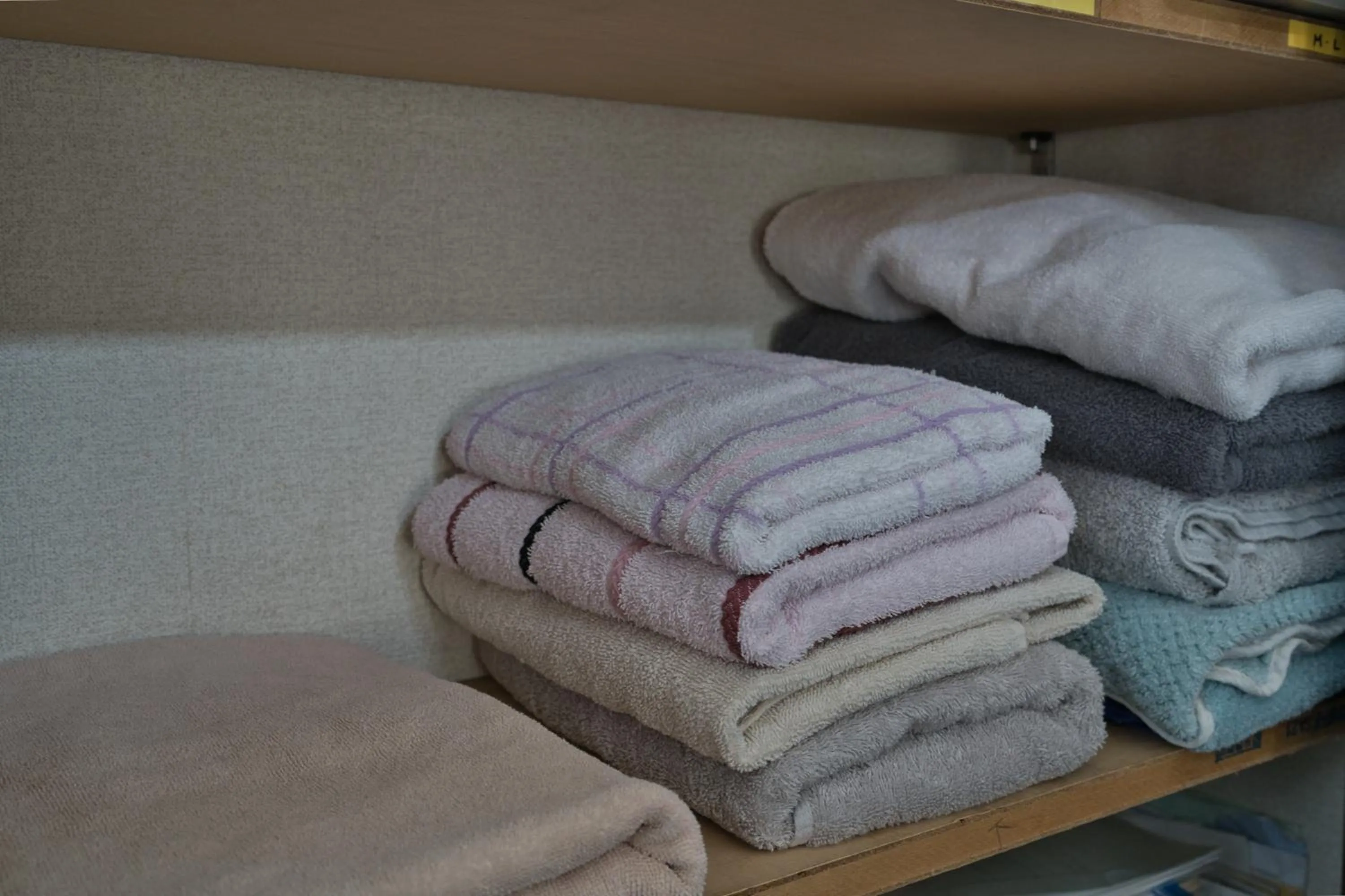 towels in IZA Kamakura Guest House and Bar