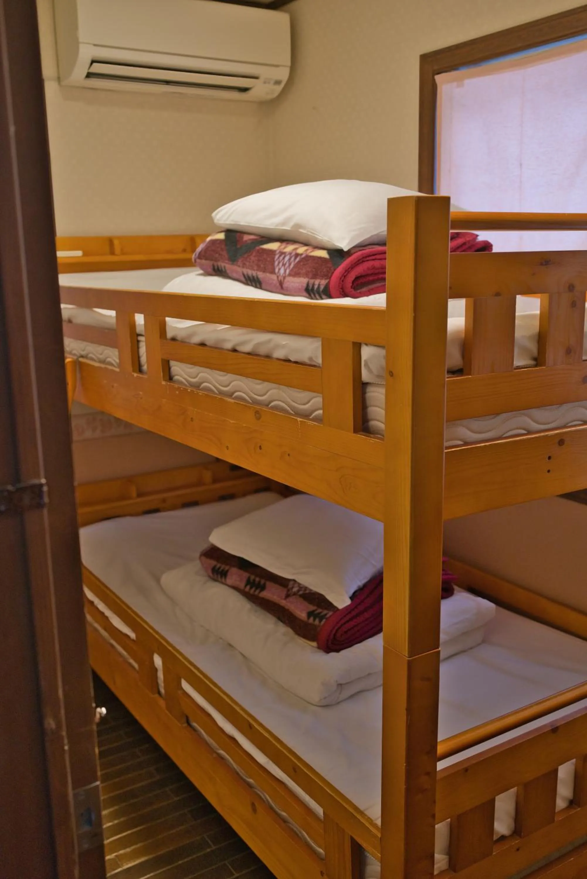 Photo of the whole room, Bed in IZA Kamakura Guest House and Bar