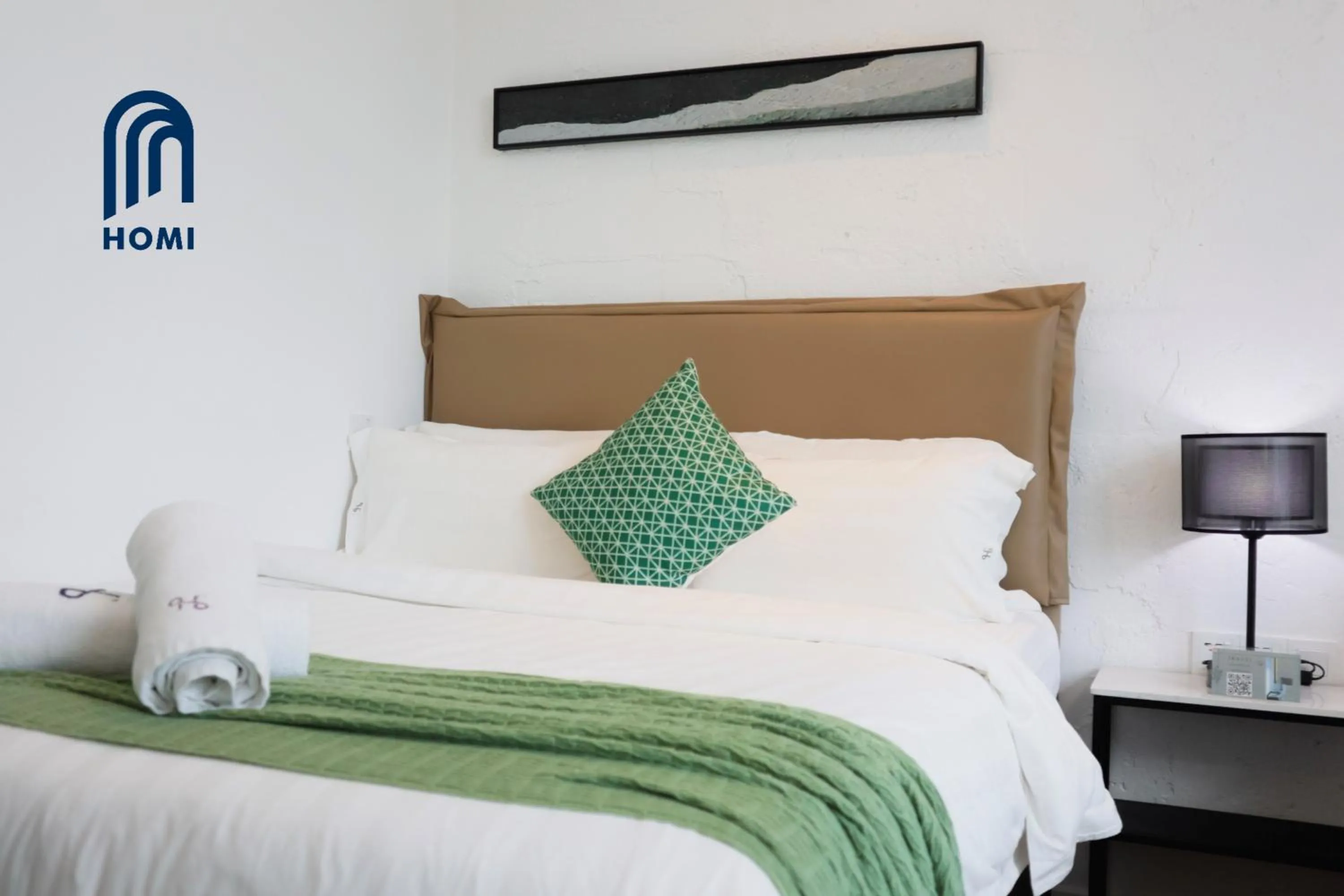 Photo of the whole room, Bed in Homi Oasis at KK Times Square 和逸绿洲