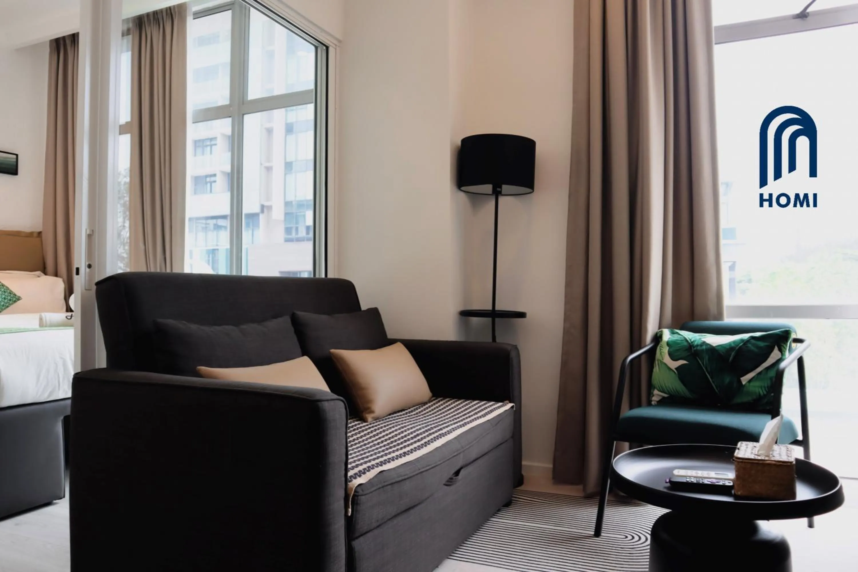 Living room in Homi Oasis at KK Times Square 和逸绿洲