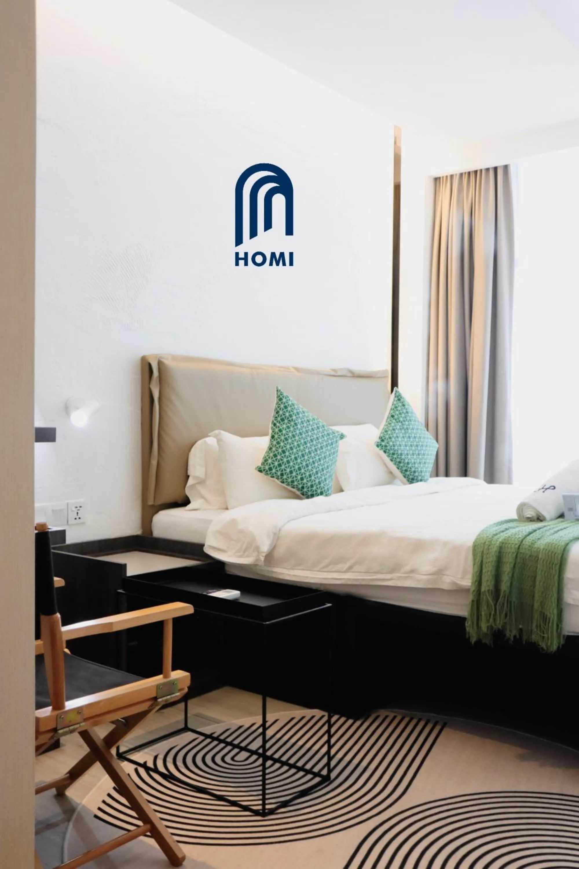 Photo of the whole room, Bed in Homi Oasis at KK Times Square 和逸绿洲