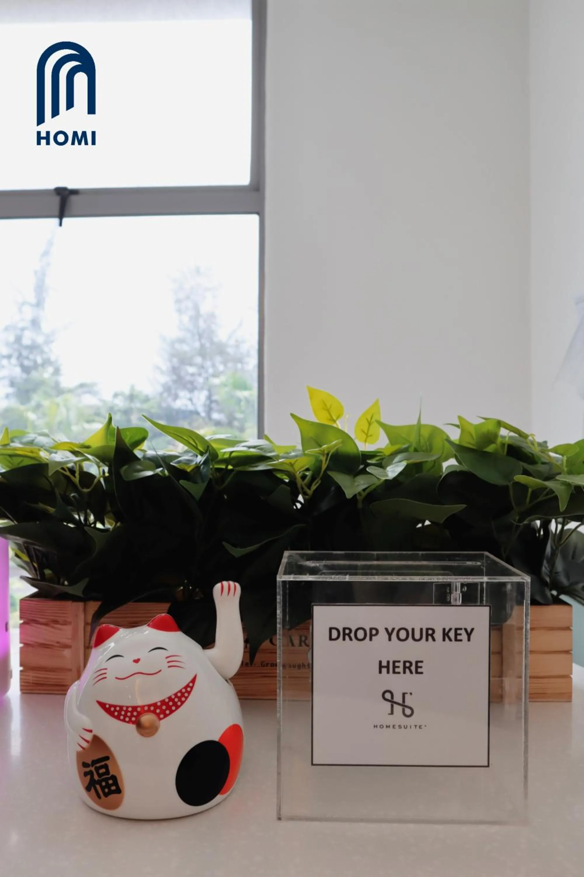 Property logo or sign in Homi Oasis at KK Times Square 和逸绿洲