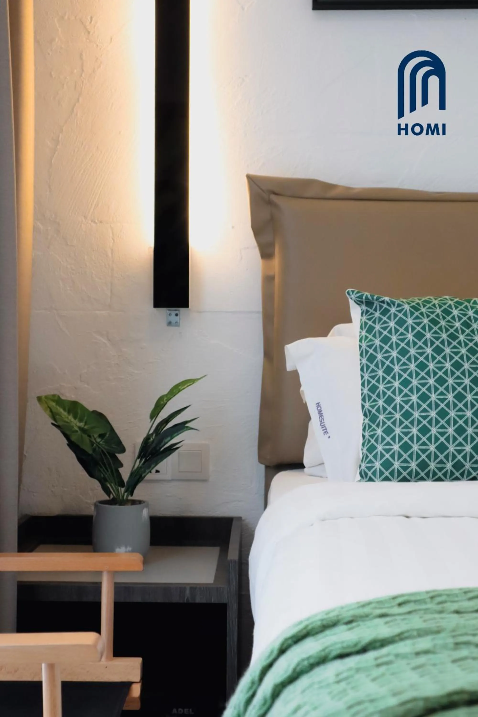 Photo of the whole room, Bed in Homi Oasis at KK Times Square 和逸绿洲