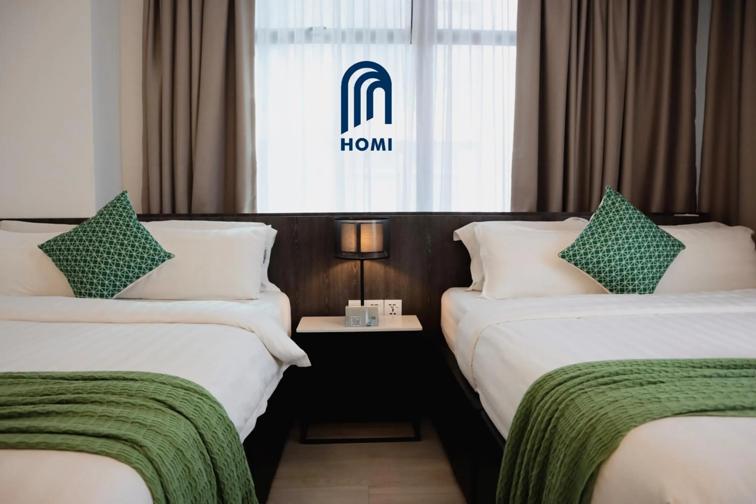 Photo of the whole room, Bed in Homi Oasis at KK Times Square 和逸绿洲