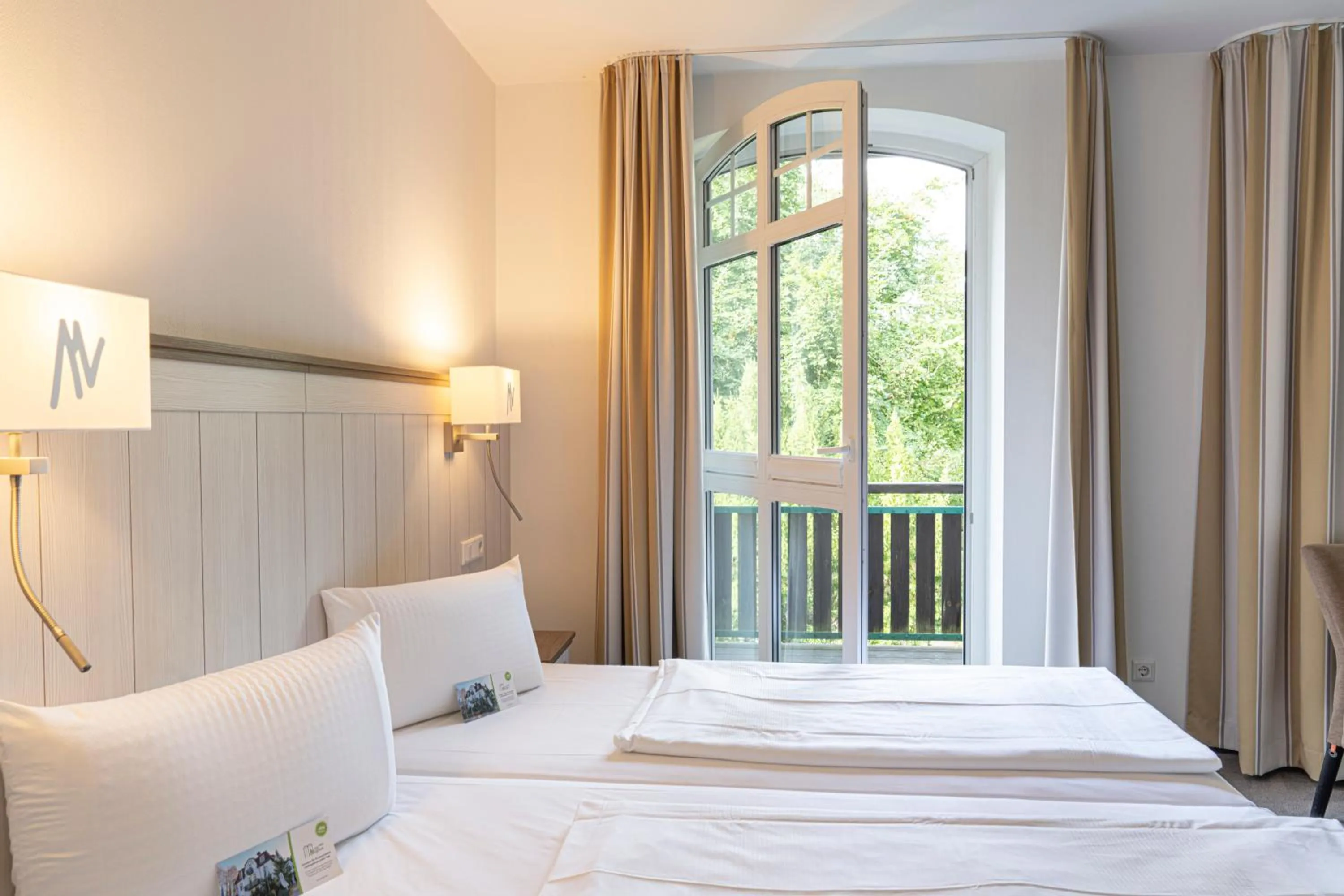 Photo of the whole room, Bed in Ringhotel Villa Margarete