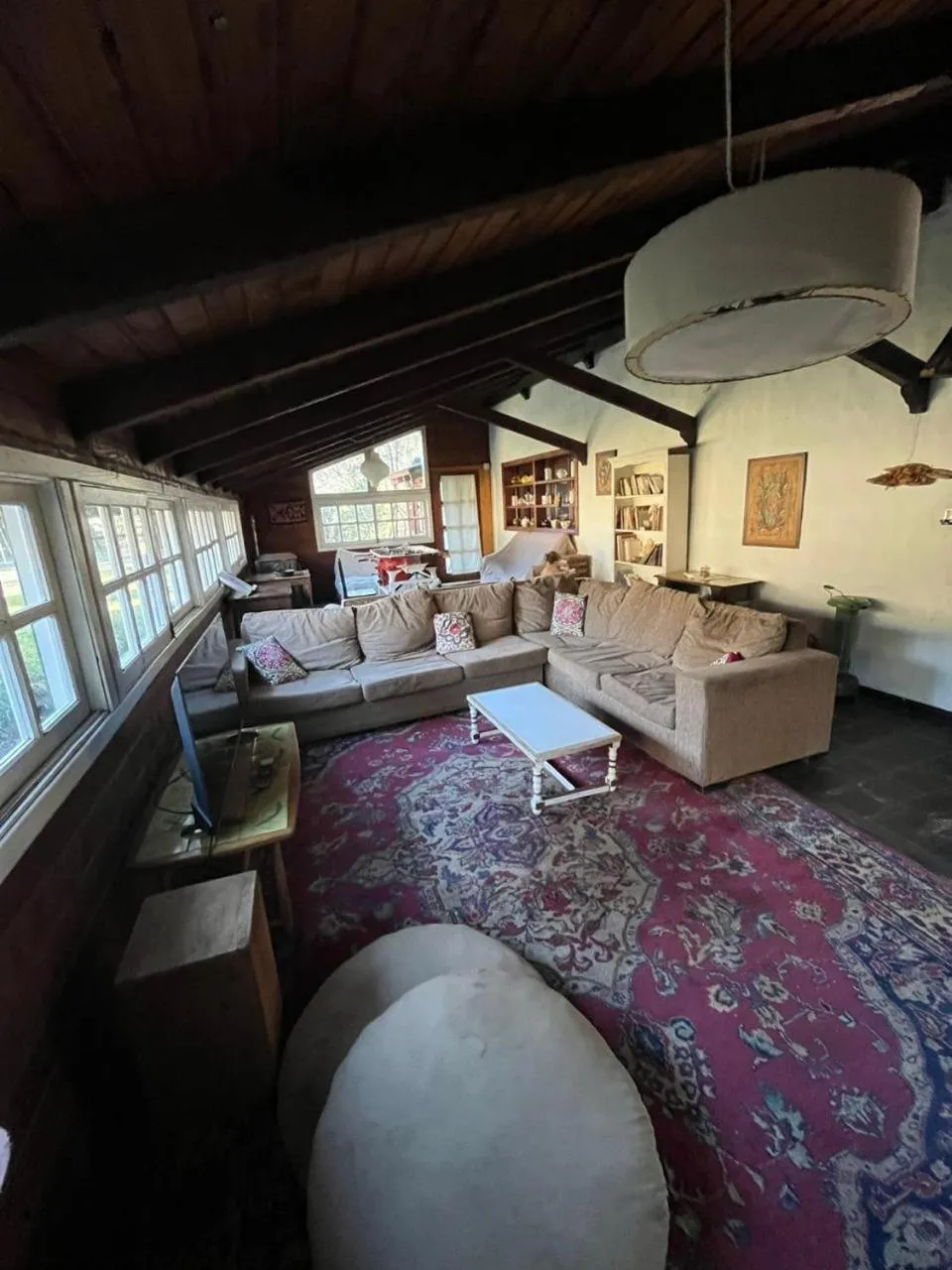 Communal lounge/ TV room in Hosteria Las Cartas