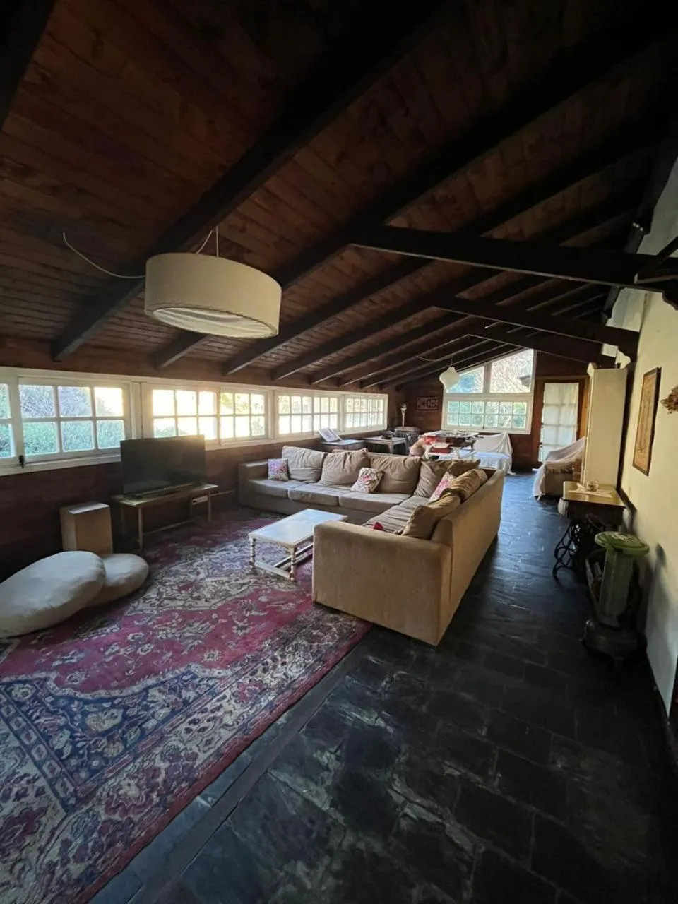 Communal lounge/ TV room in Hosteria Las Cartas