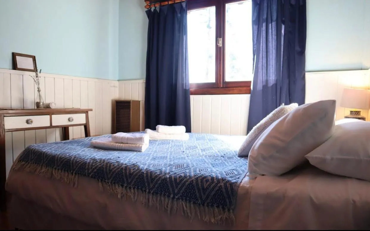 Bed in Hosteria Las Cartas