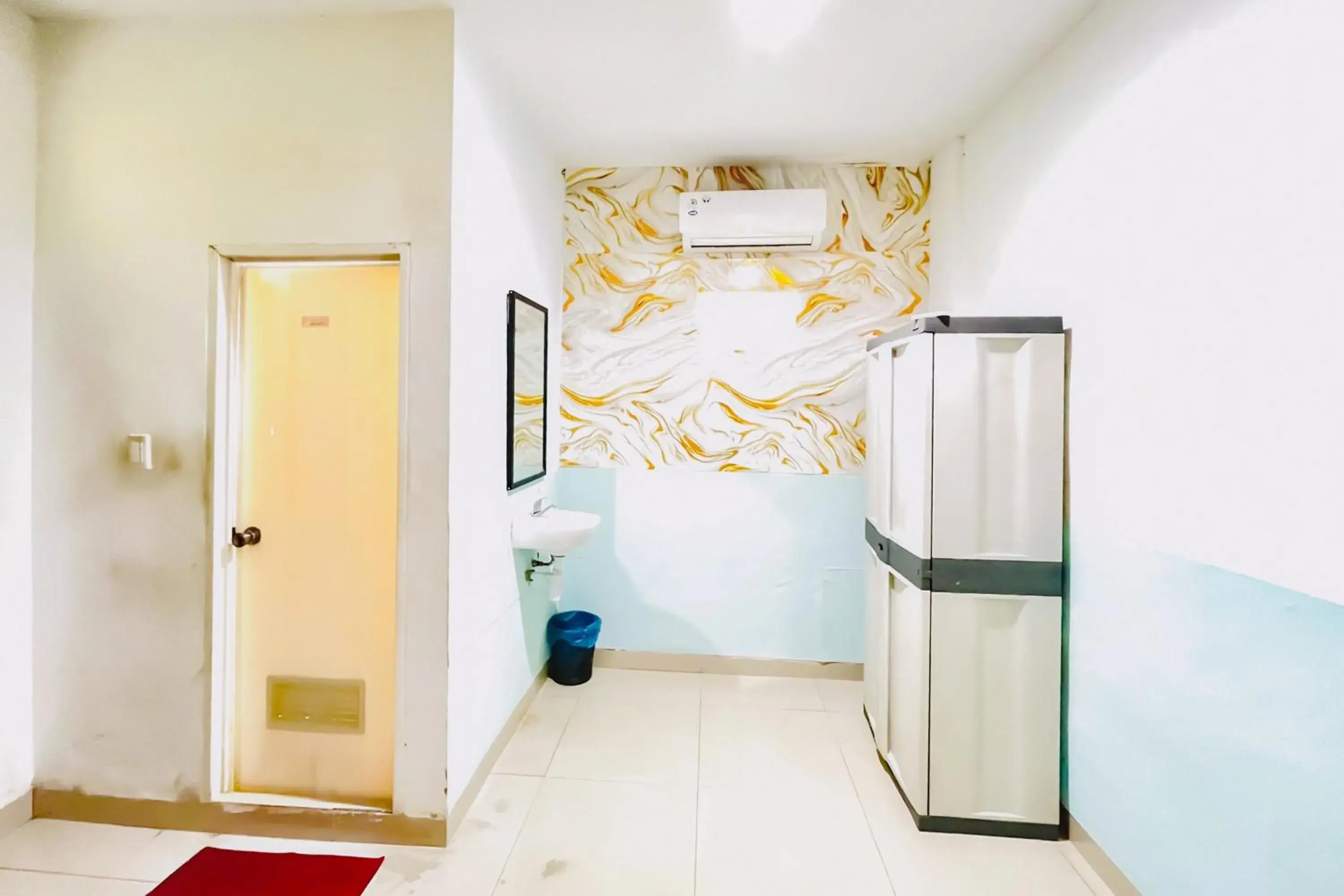 Bedroom in RedDoorz at STM Suite Medan Amplas Bedroom in RedDoorz at STM Suite Medan Amplas