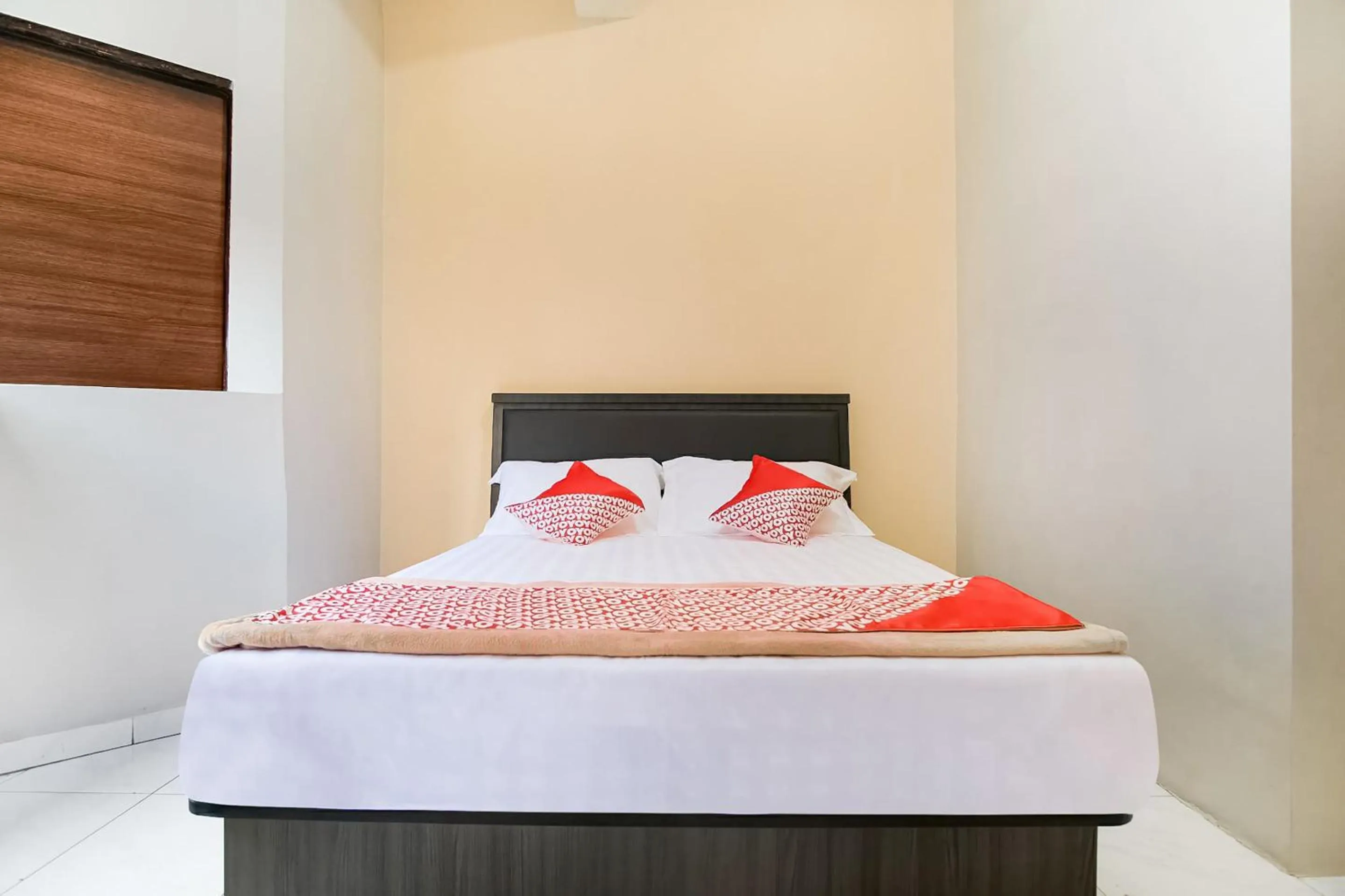 Bedroom in OYO 3212 Coffee Jodoh Homestay