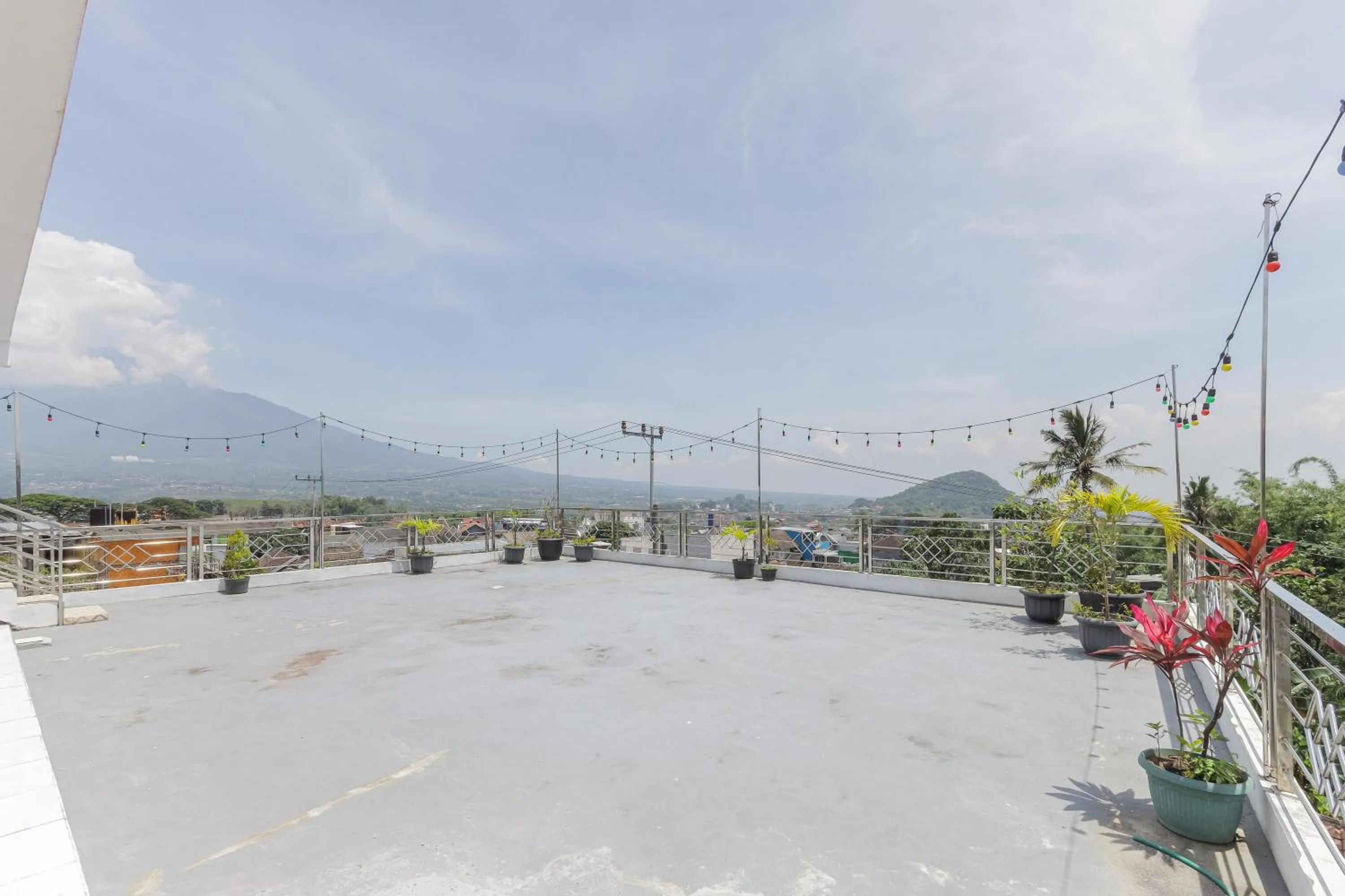 Balcony/Terrace in Urbanview Hotel Near Jatim Park 3 by RedDoorz