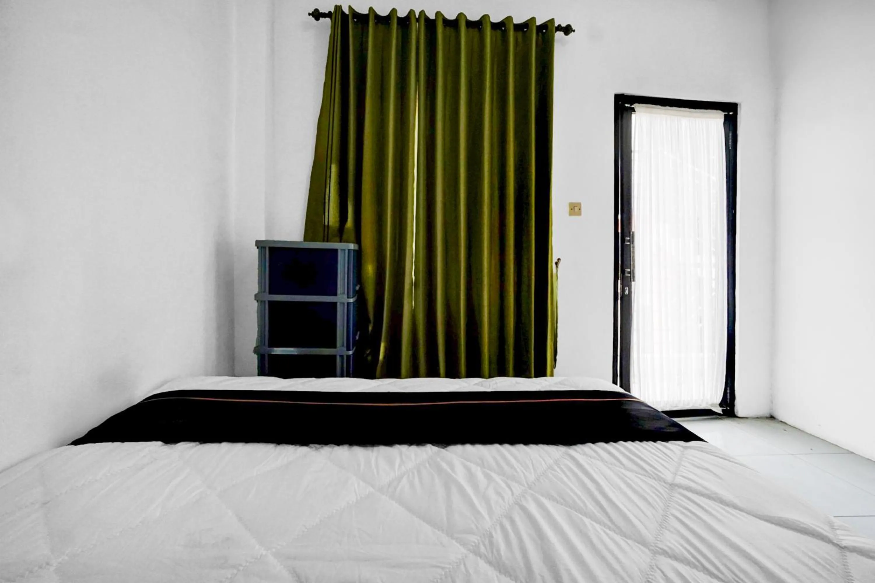 Bedroom in Hotel O near Jatim Park 3 formerly Srikandi Residence