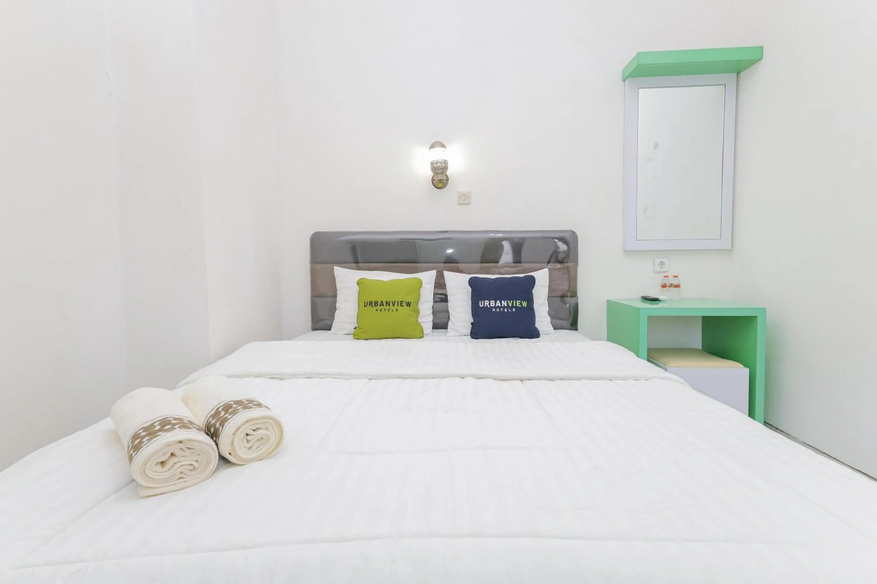 Bedroom in Urbanview Hotel Near Jatim Park 3 by RedDoorz