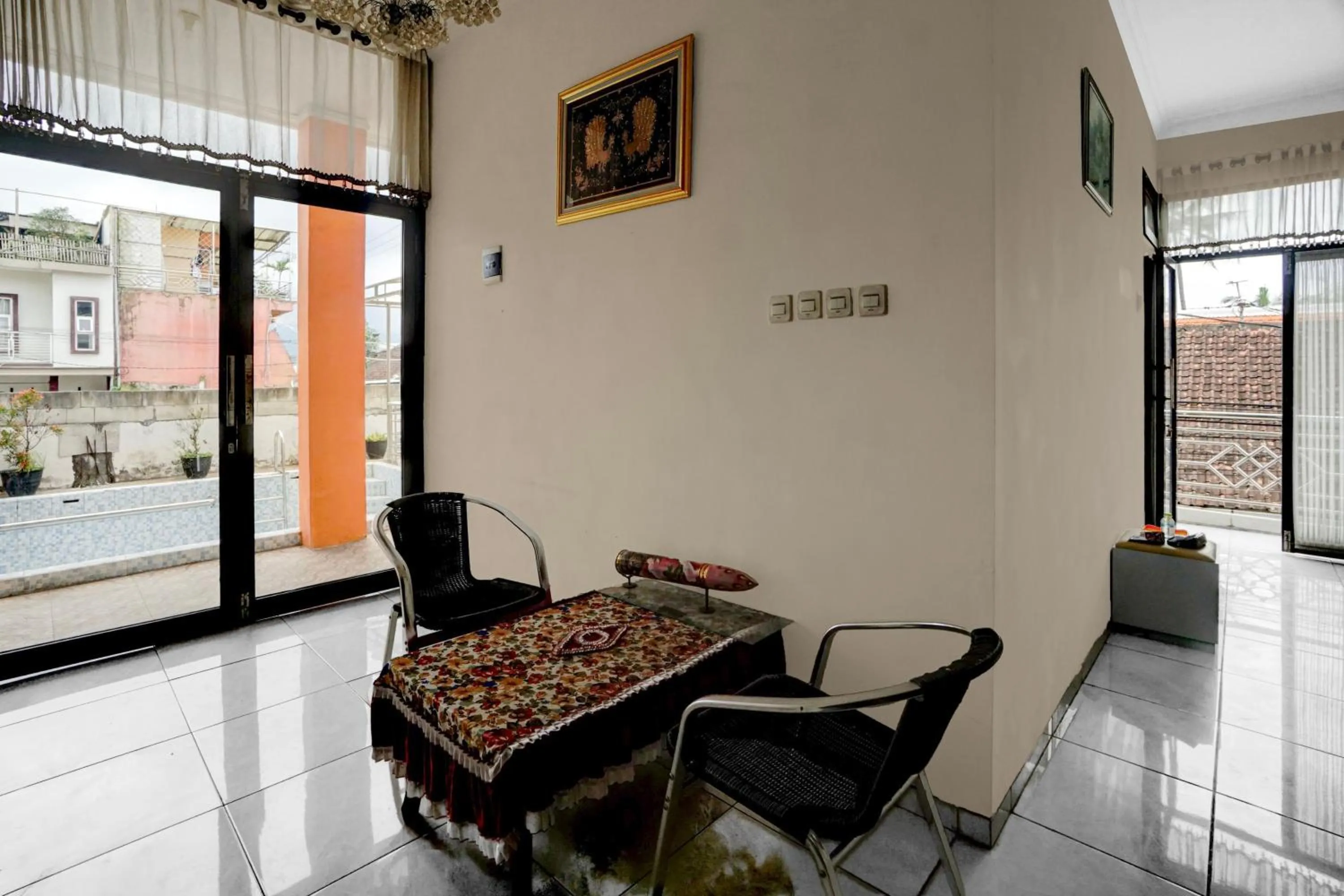 Seating area in Hotel O near Jatim Park 3 formerly Srikandi Residence