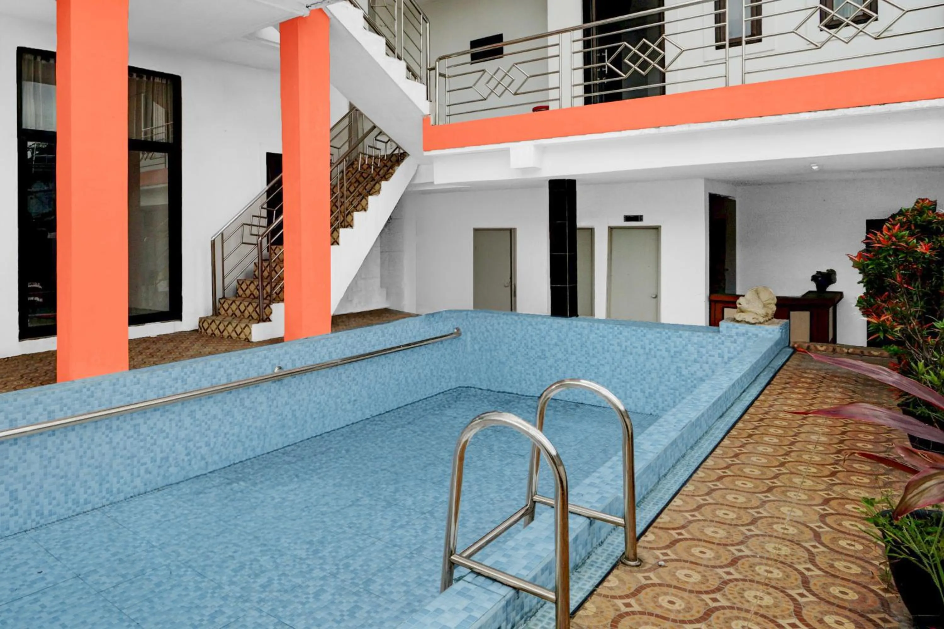 Swimming pool in Hotel O near Jatim Park 3 formerly Srikandi Residence